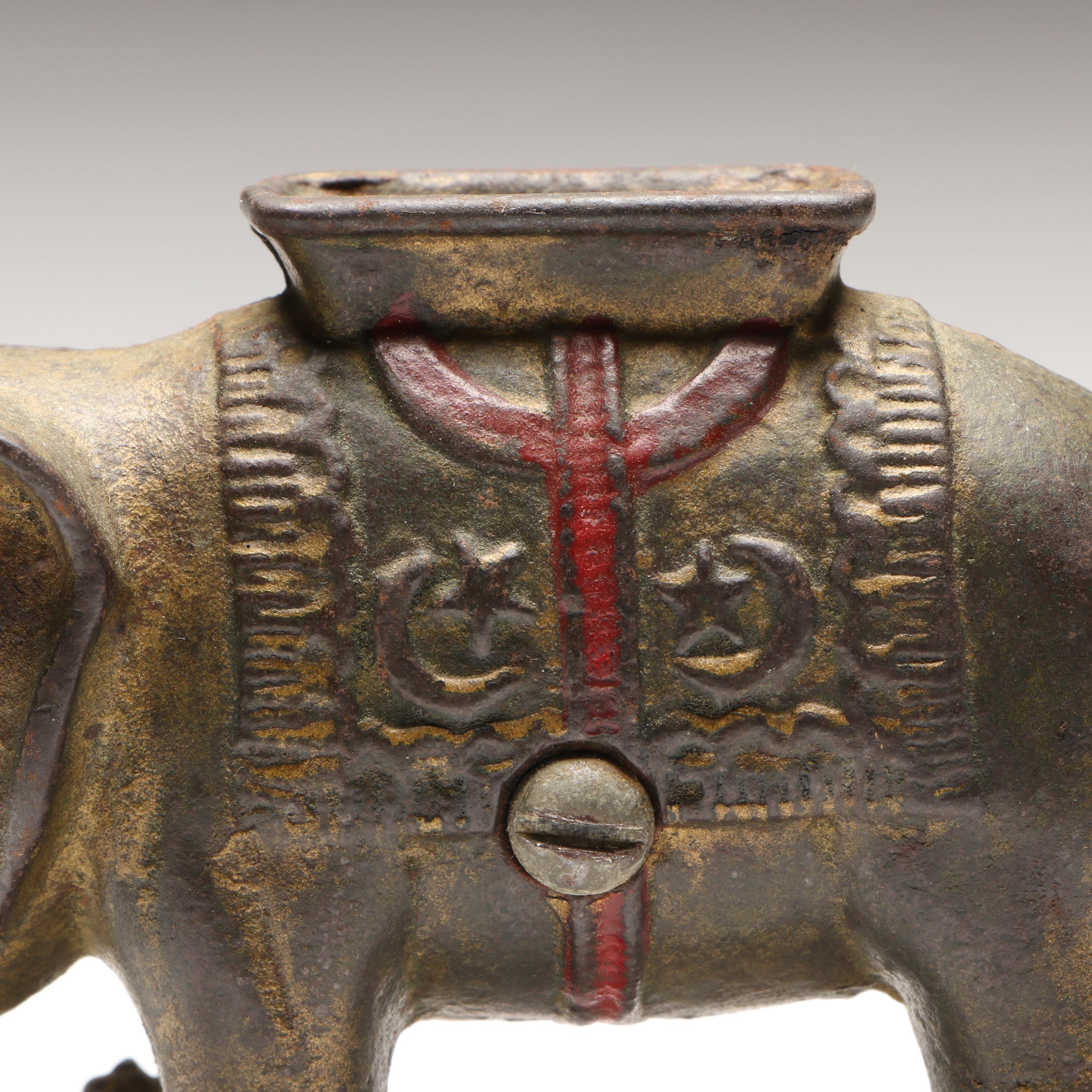 A. C. Williams Cast Iron Elephant Coin Bank on Wheels