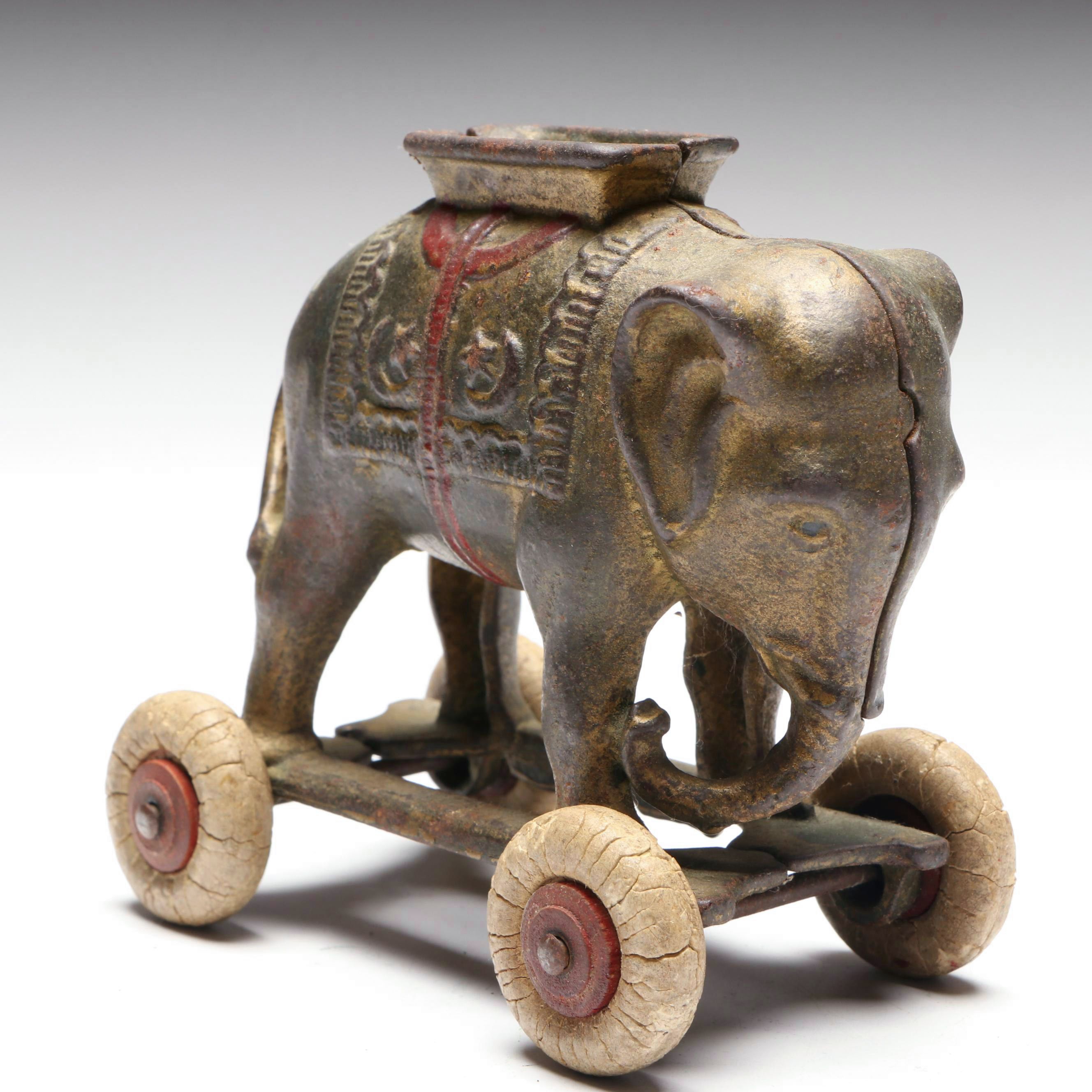 A. C. Williams Cast Iron Elephant Coin Bank on Wheels