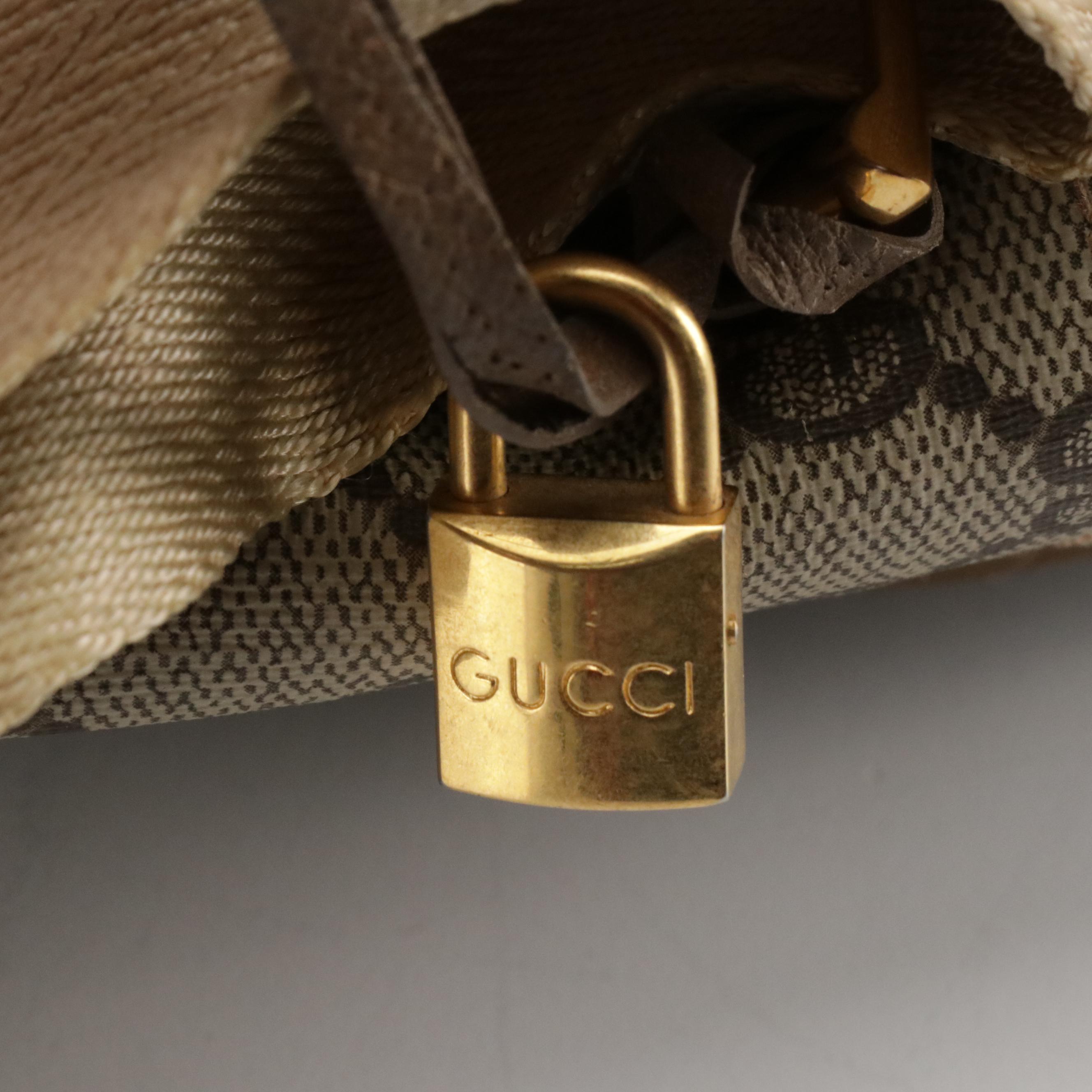 Gucci Three-Compartment Two-Way Travel Bag in GG Supreme Canvas and Leather