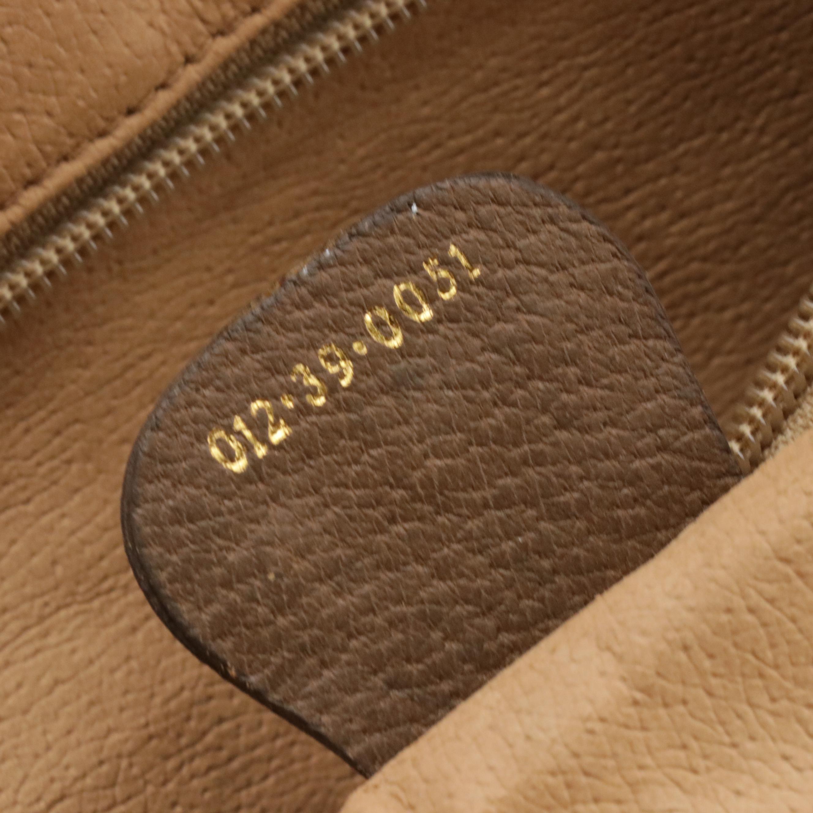 Gucci Three-Compartment Two-Way Travel Bag in GG Supreme Canvas and Leather