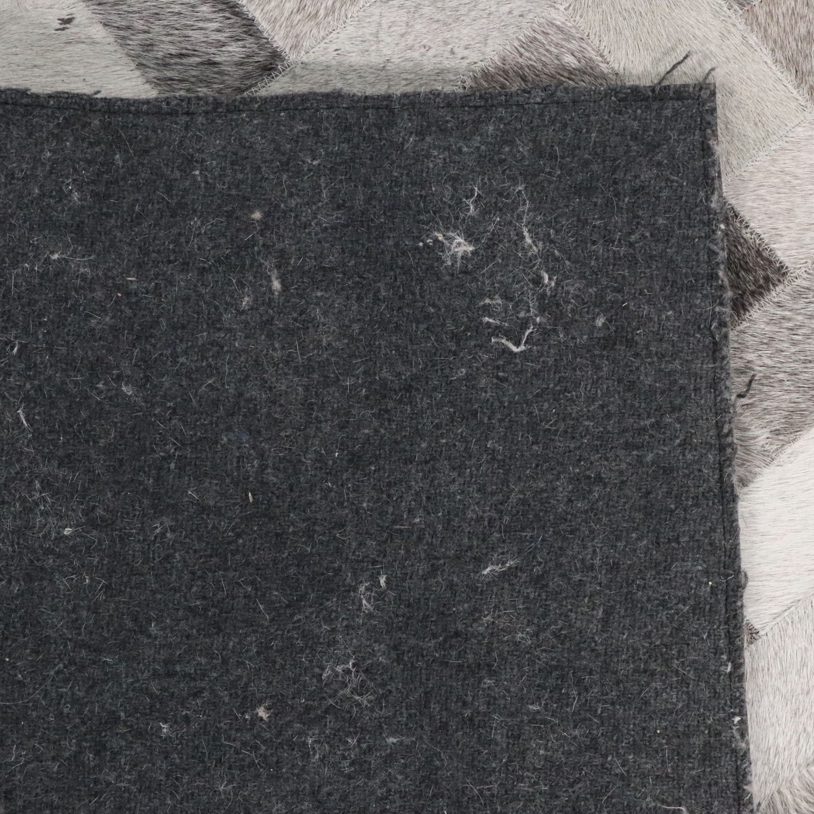 4'3 x 6' Handmade Patchwork Cowhide Area Rug