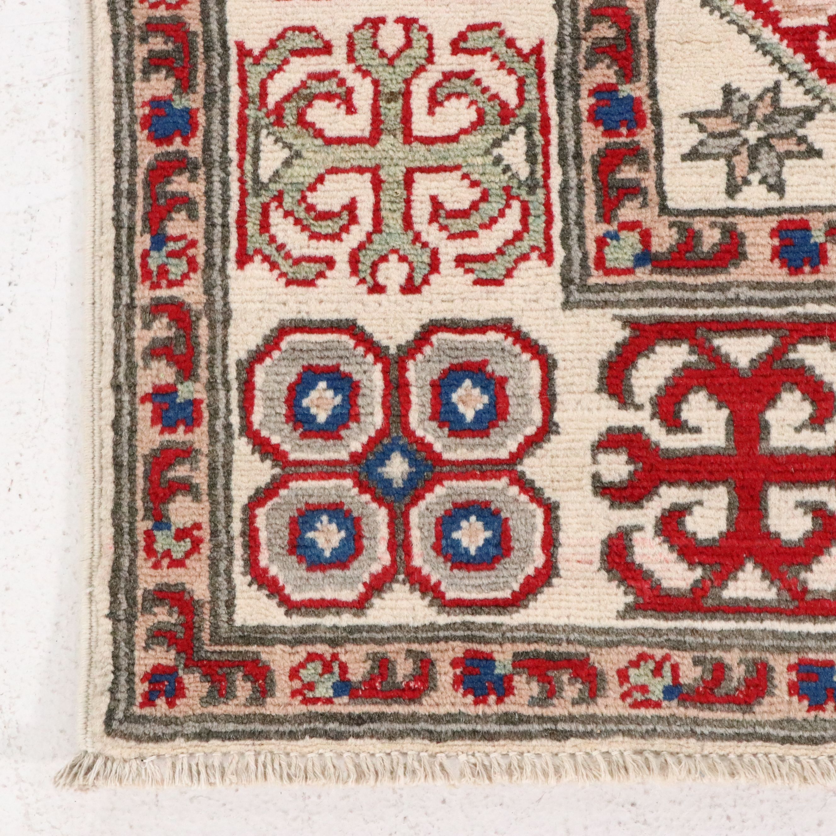 4'9 x 6'6 Hand-Knotted Pakistani Kazak Area Rug