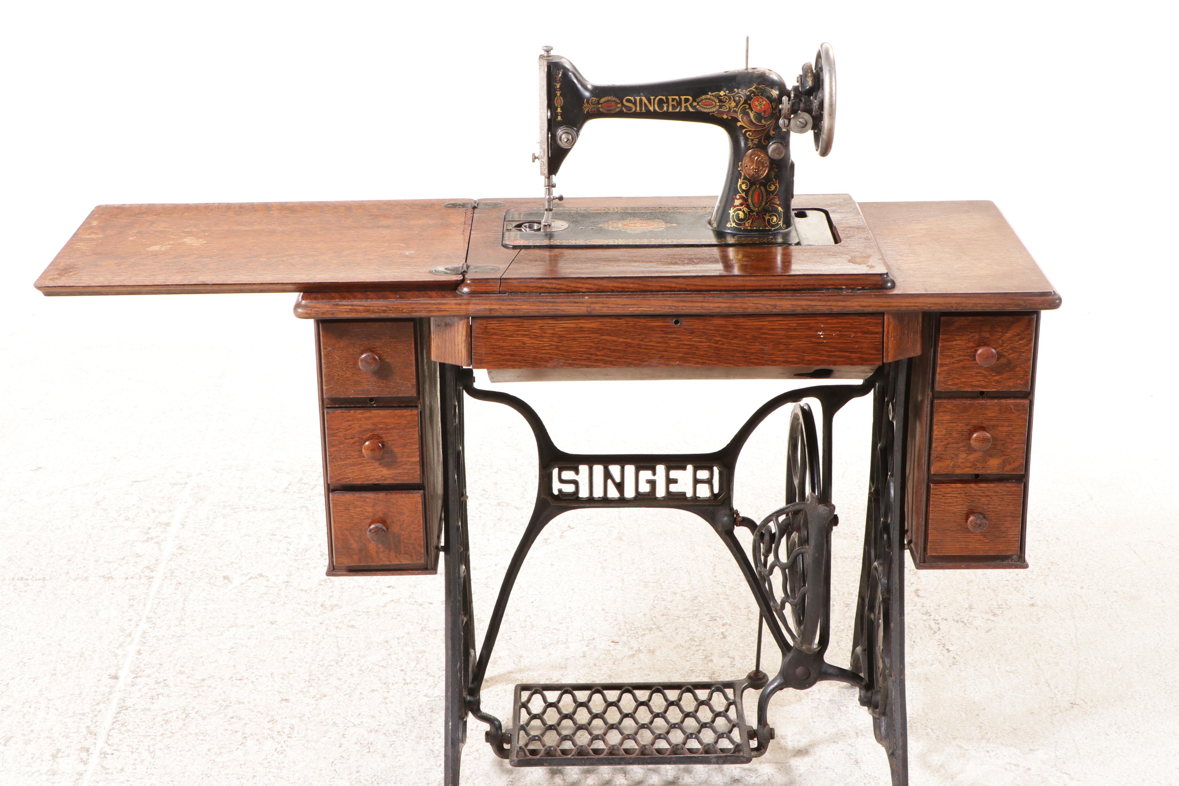 Singer Model 66 Treadle Sewing Machine in Oak Cabinet, 1922