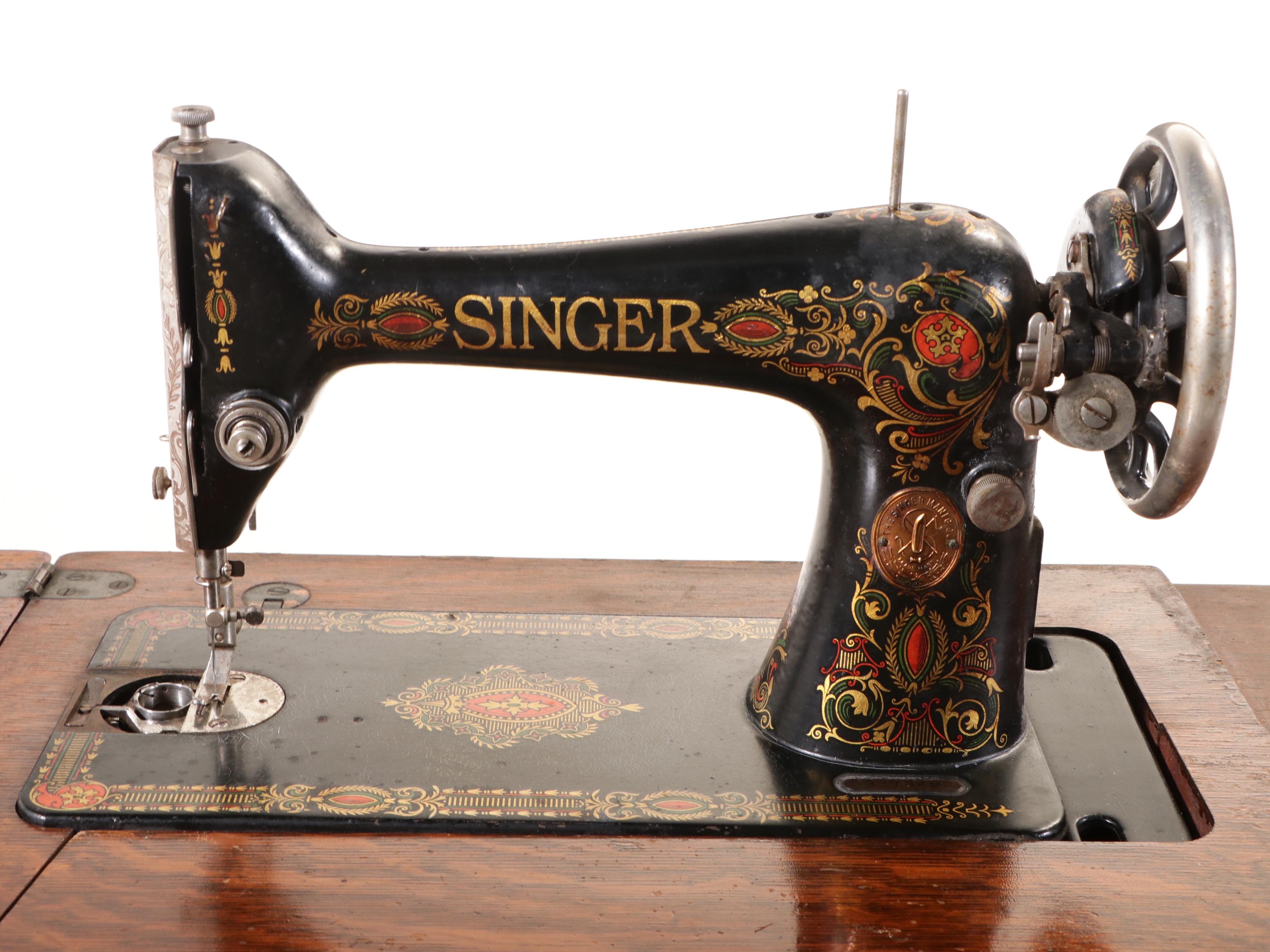 Singer Model 66 Treadle Sewing Machine in Oak Cabinet, 1922