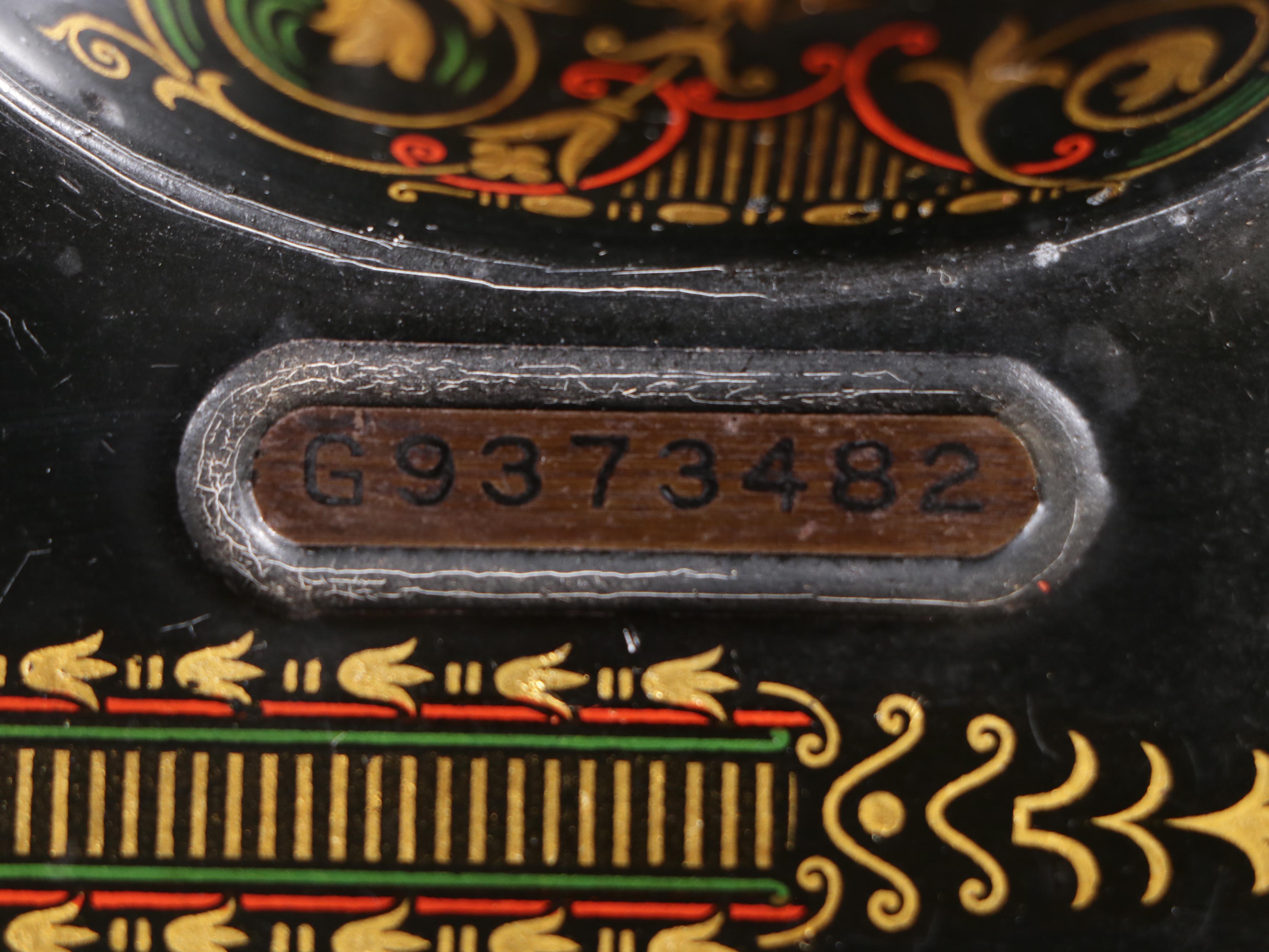 Singer Model 66 Treadle Sewing Machine in Oak Cabinet, 1922