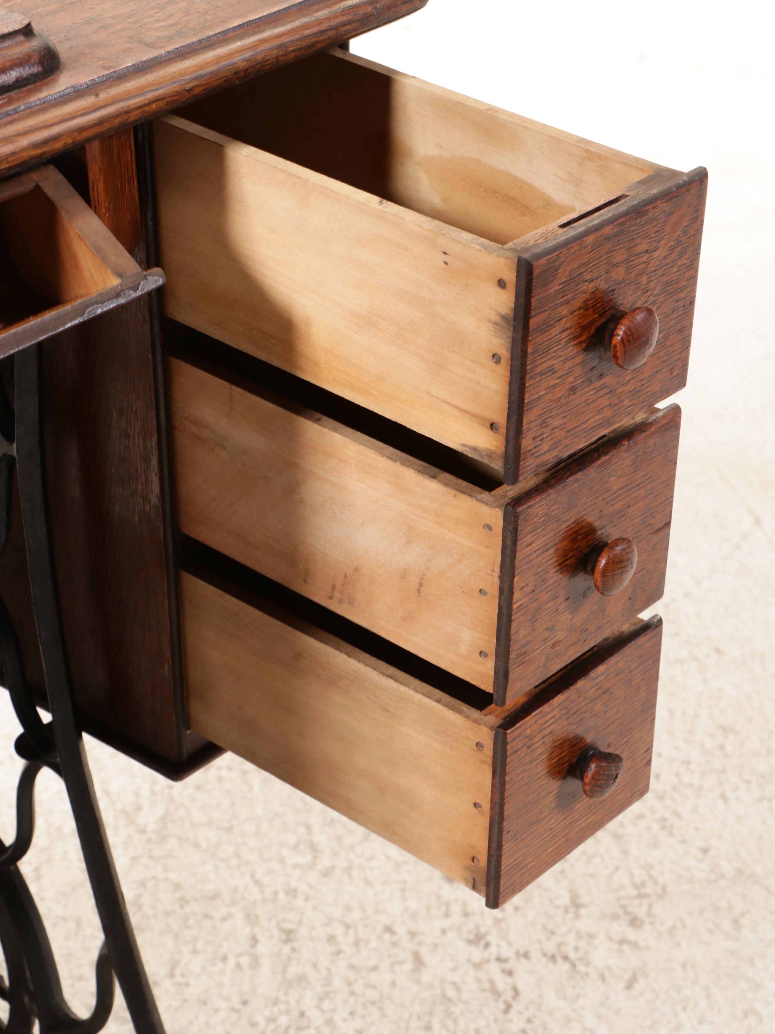 Singer Model 66 Treadle Sewing Machine in Oak Cabinet, 1922
