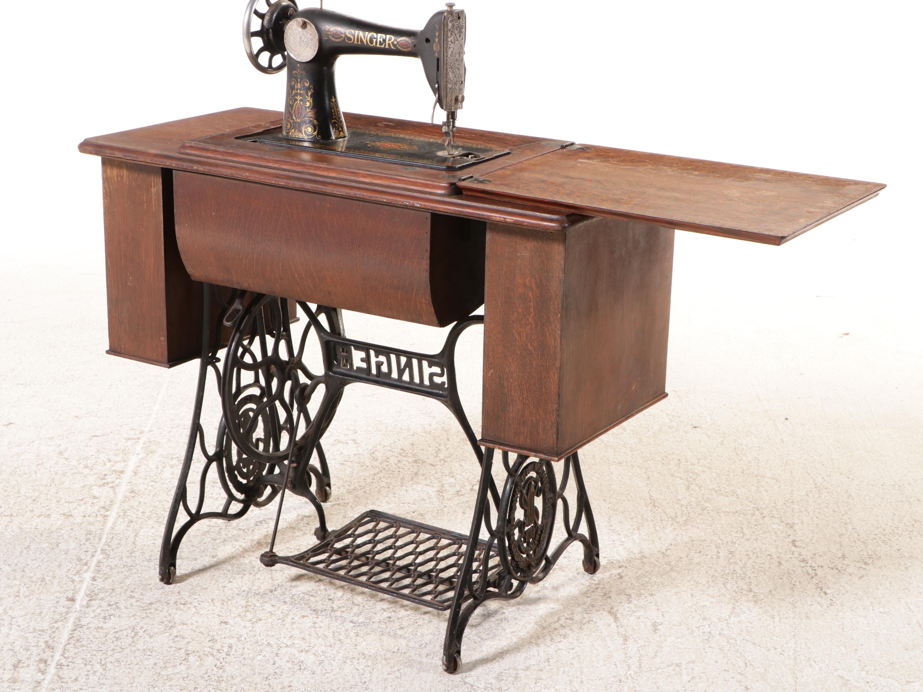 Singer Model 66 Treadle Sewing Machine in Oak Cabinet, 1922