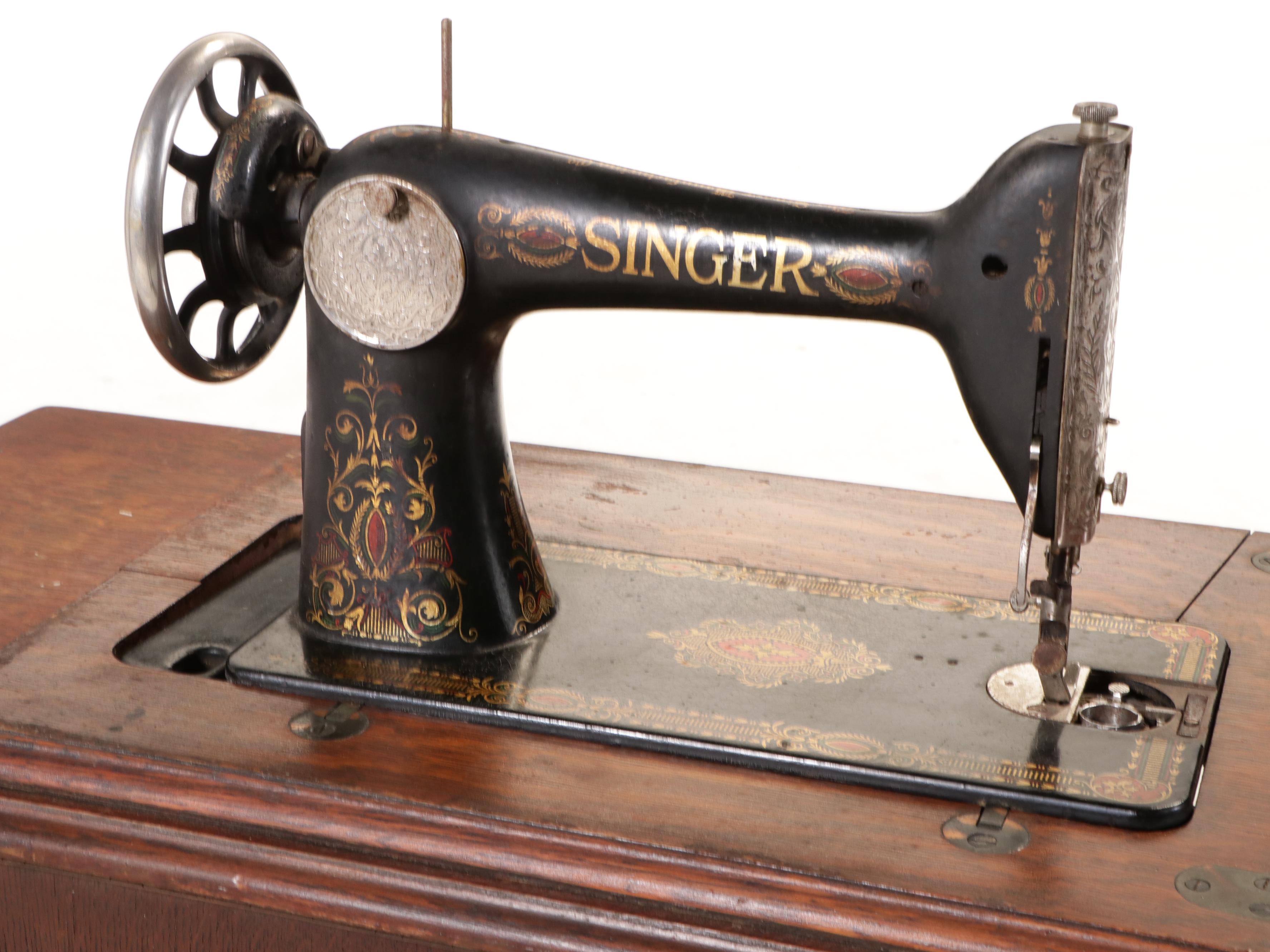 Singer Model 66 Treadle Sewing Machine in Oak Cabinet, 1922