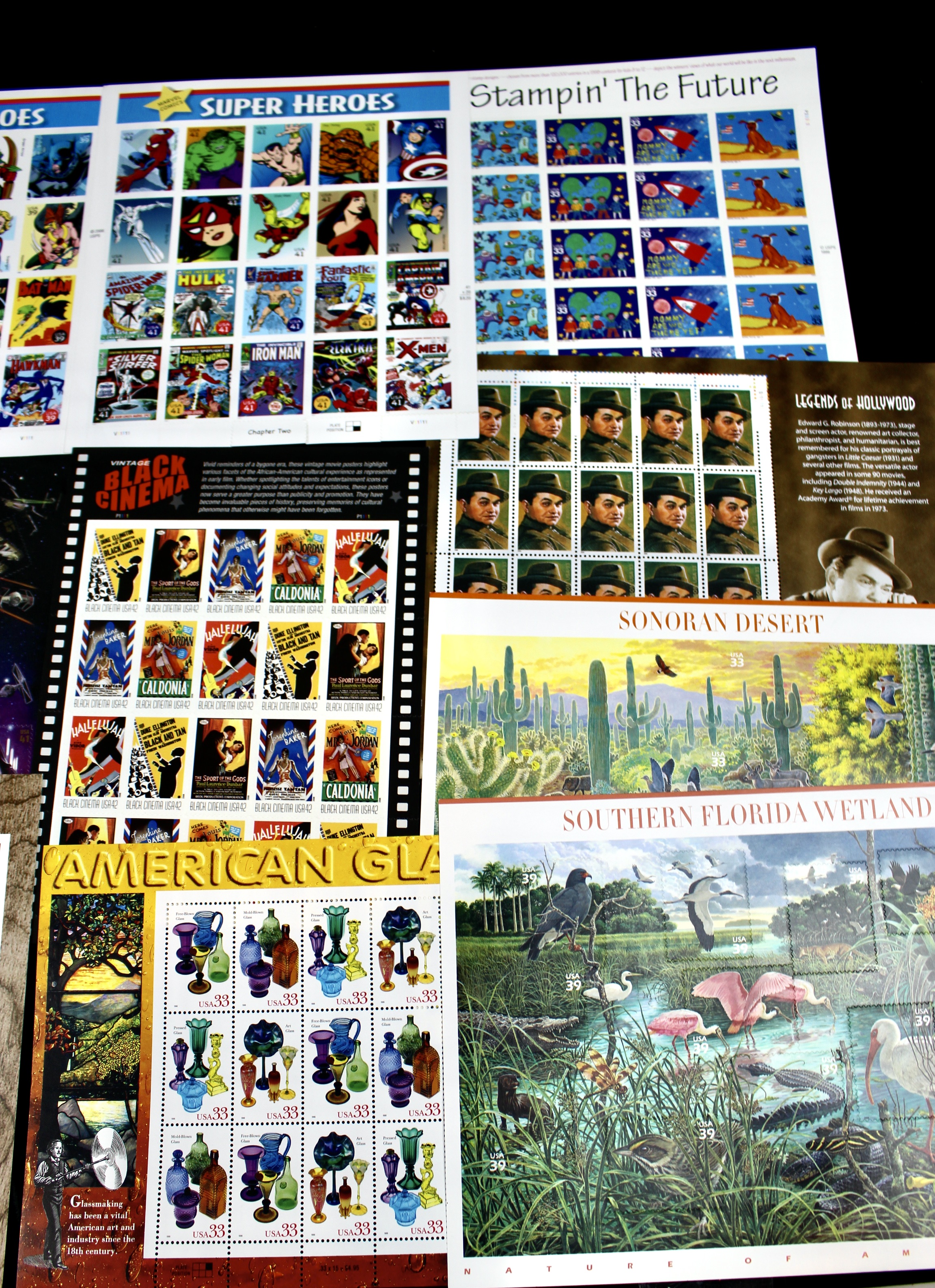 Sixteen Different Miniature Postage Stamp Sheets