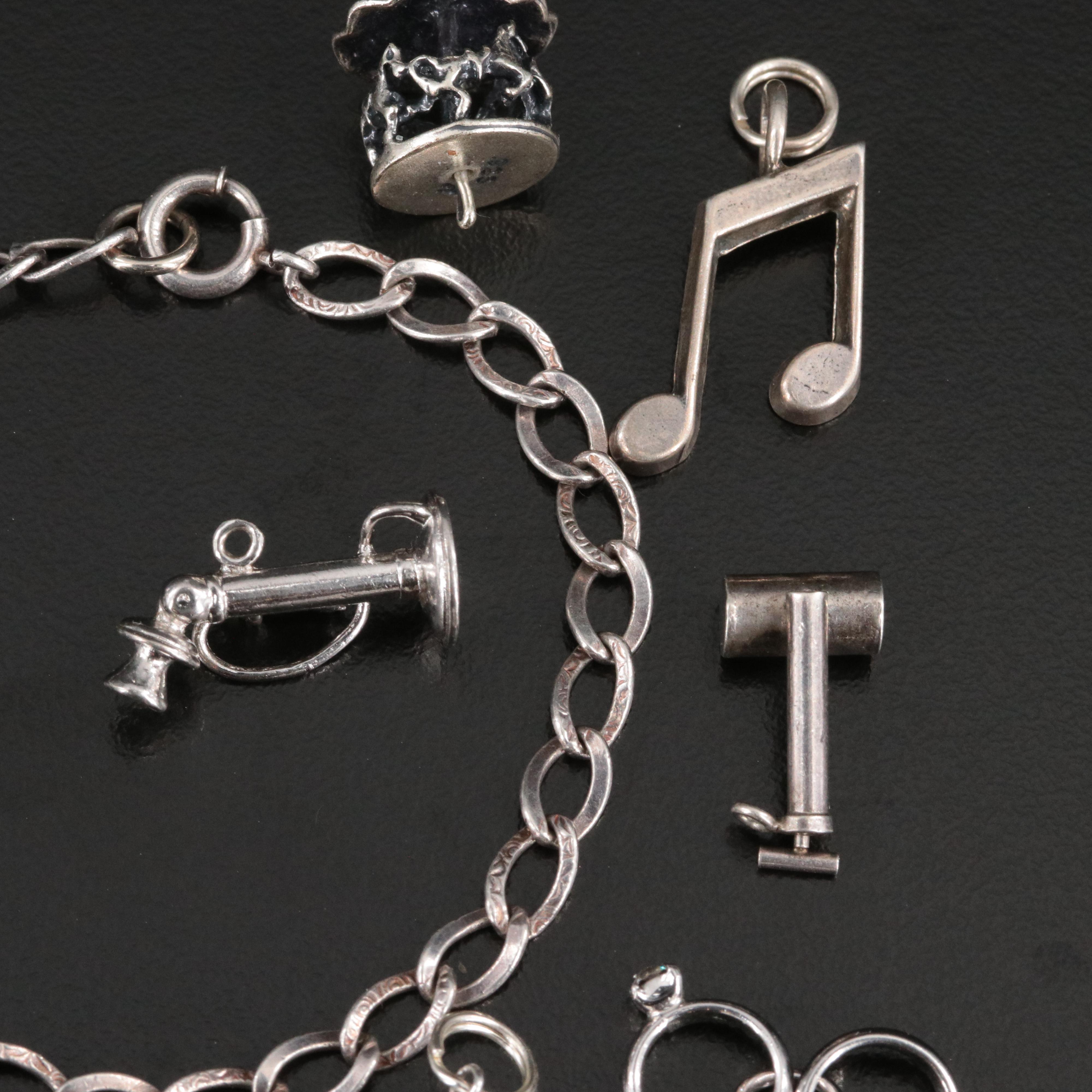 Sterling Bracelet and Charms Featuring Articulation