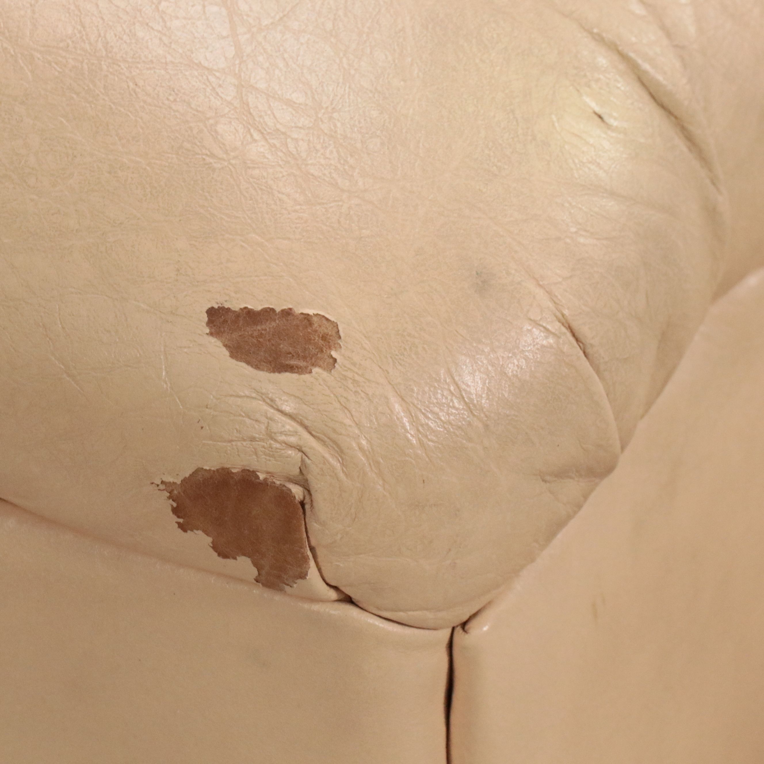 Overstuffed Leather Upholstered Loveseat