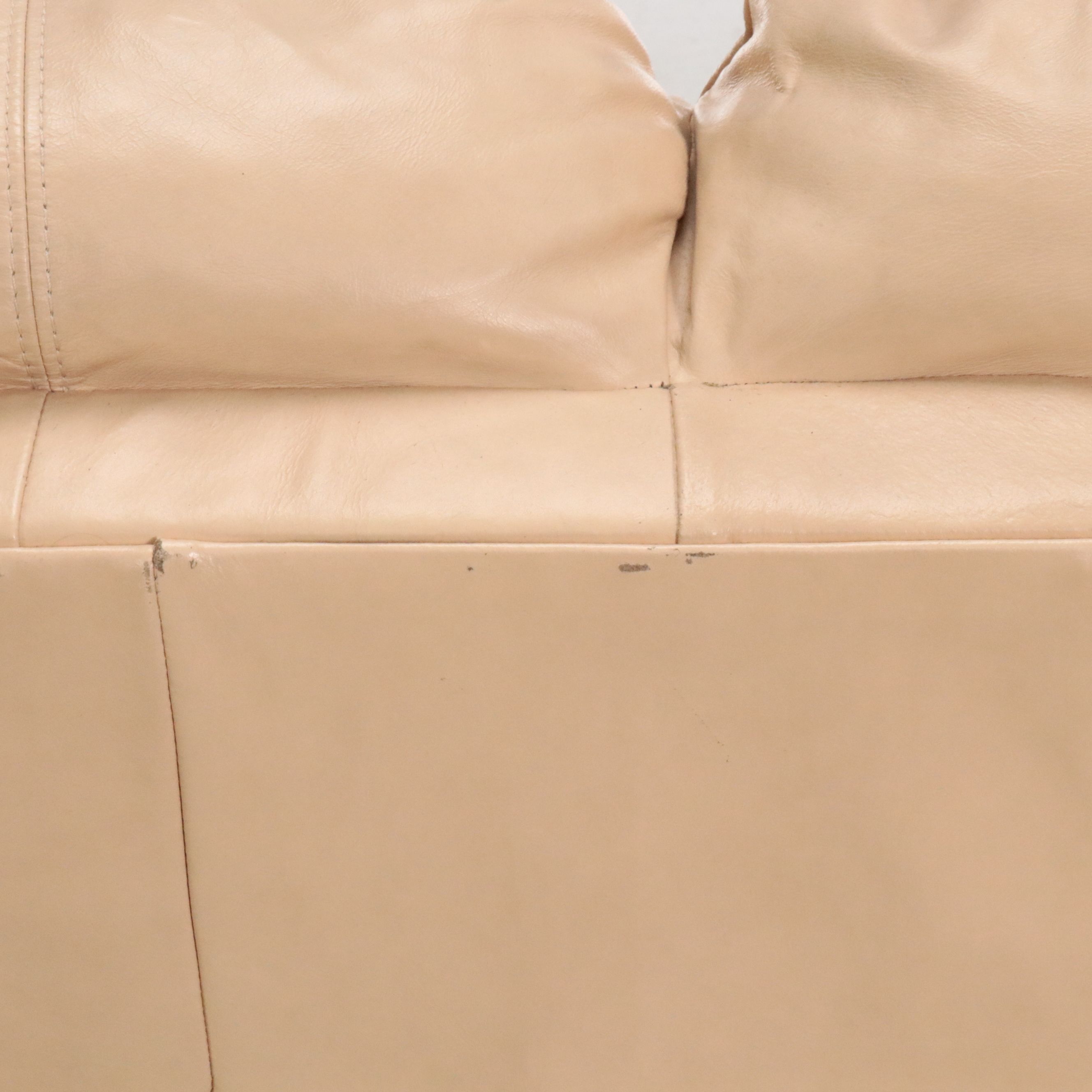 Overstuffed Leather Upholstered Loveseat