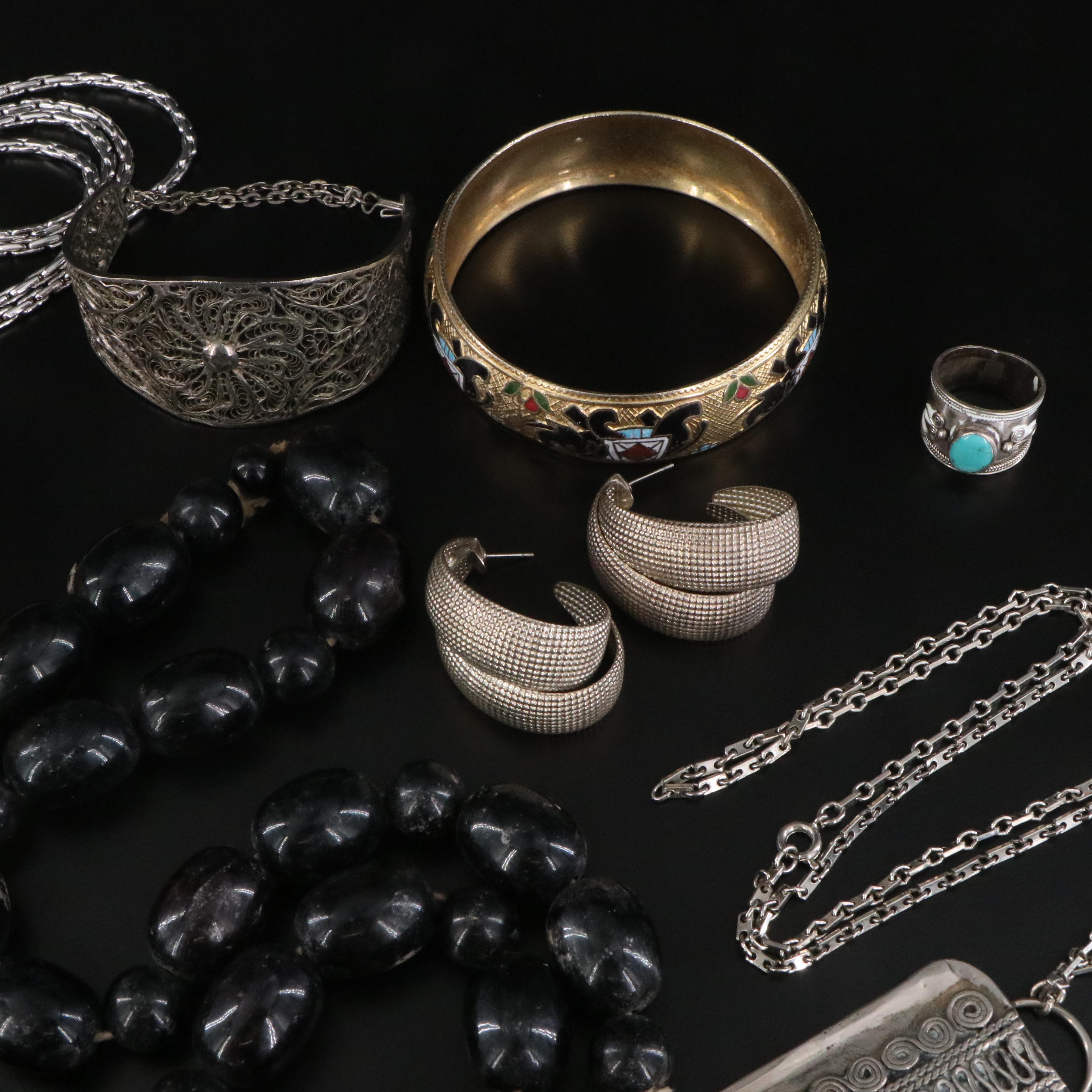 Turquoise and Cloisonné Featured in Jewelry Collection