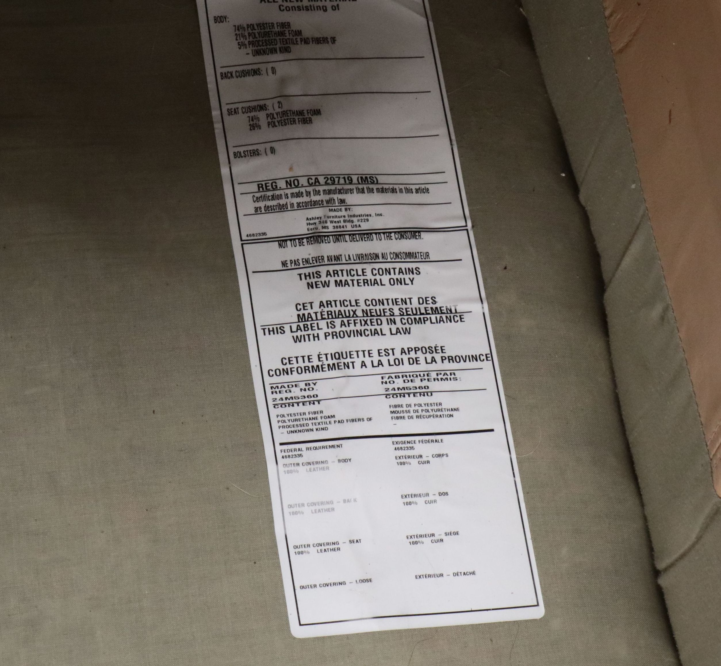 Overstuffed Leather Upholstered Loveseat