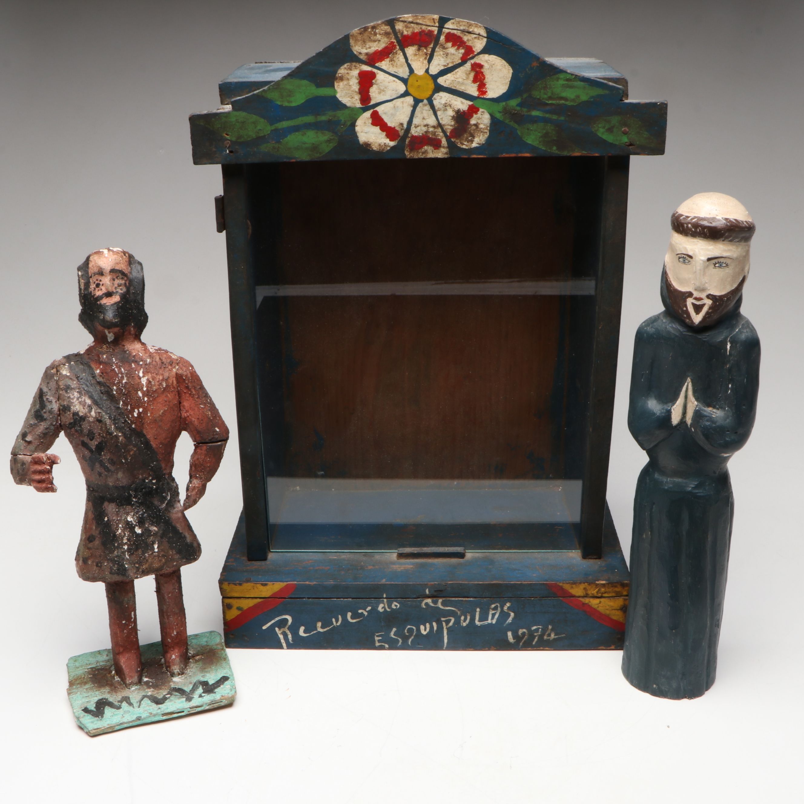 Two Latin American Folk Art Santos with Glass-Fronted Shrine