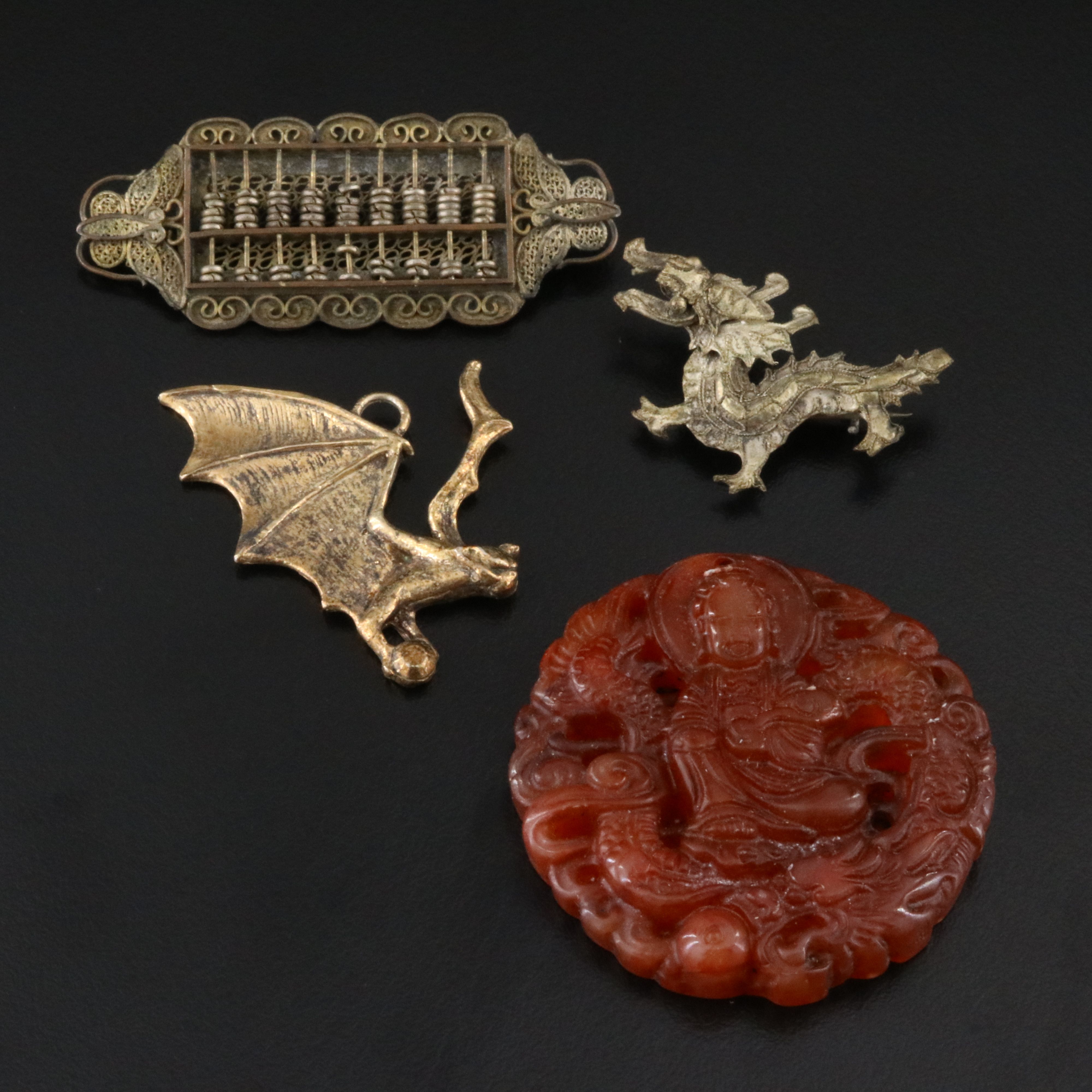 Carnelian Guanyin and Dragon Featured in East Asian Motif Jewelry