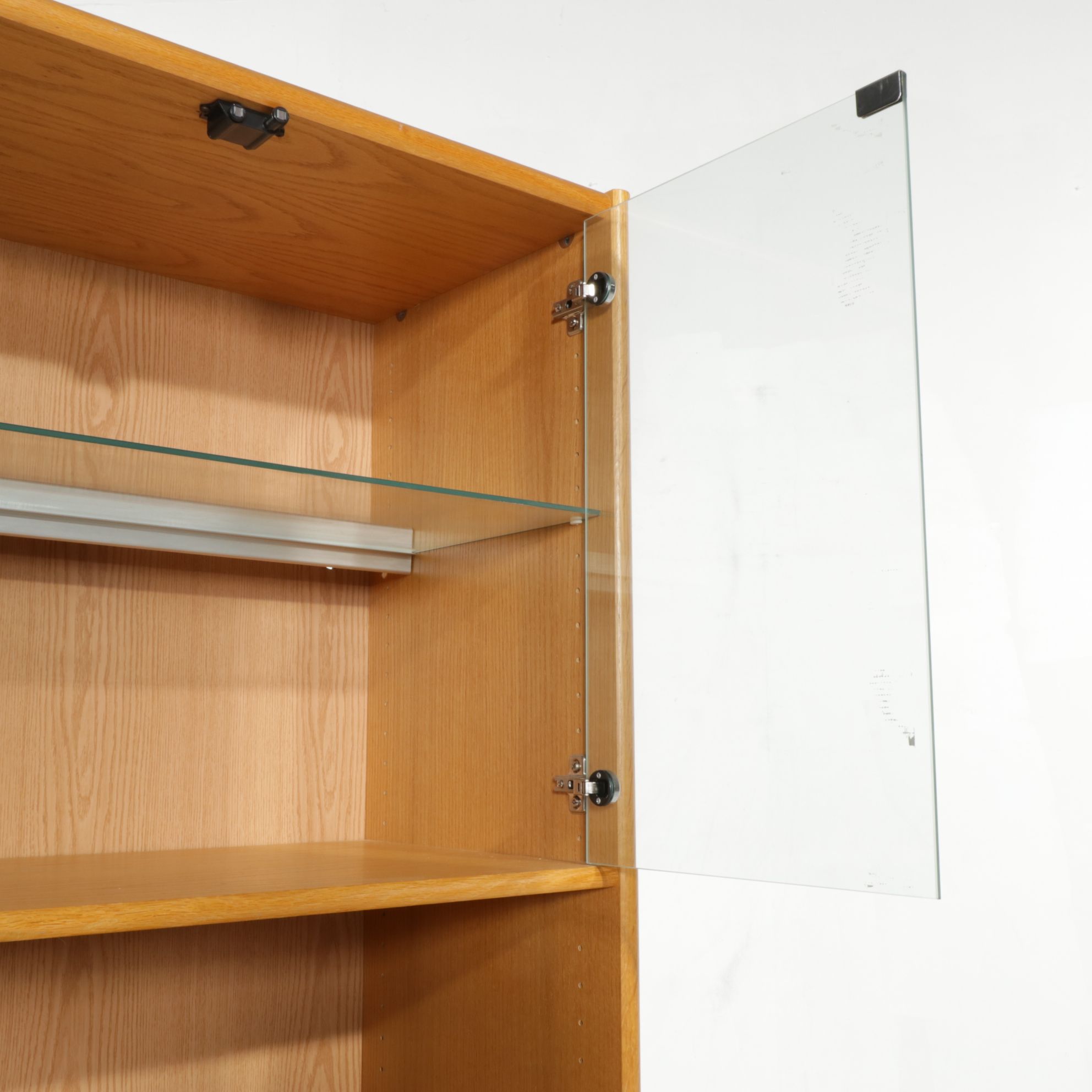 Two Oak Grain Finished Wall Unit Cabinets with Illuminated Display Shelves
