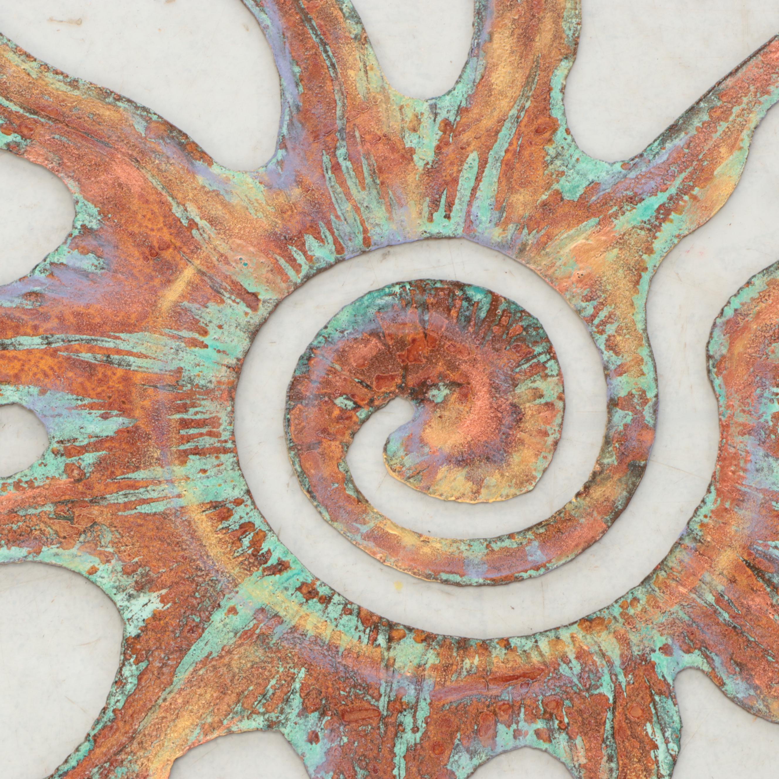 Patinated Metal Sunburst Wall Hanging