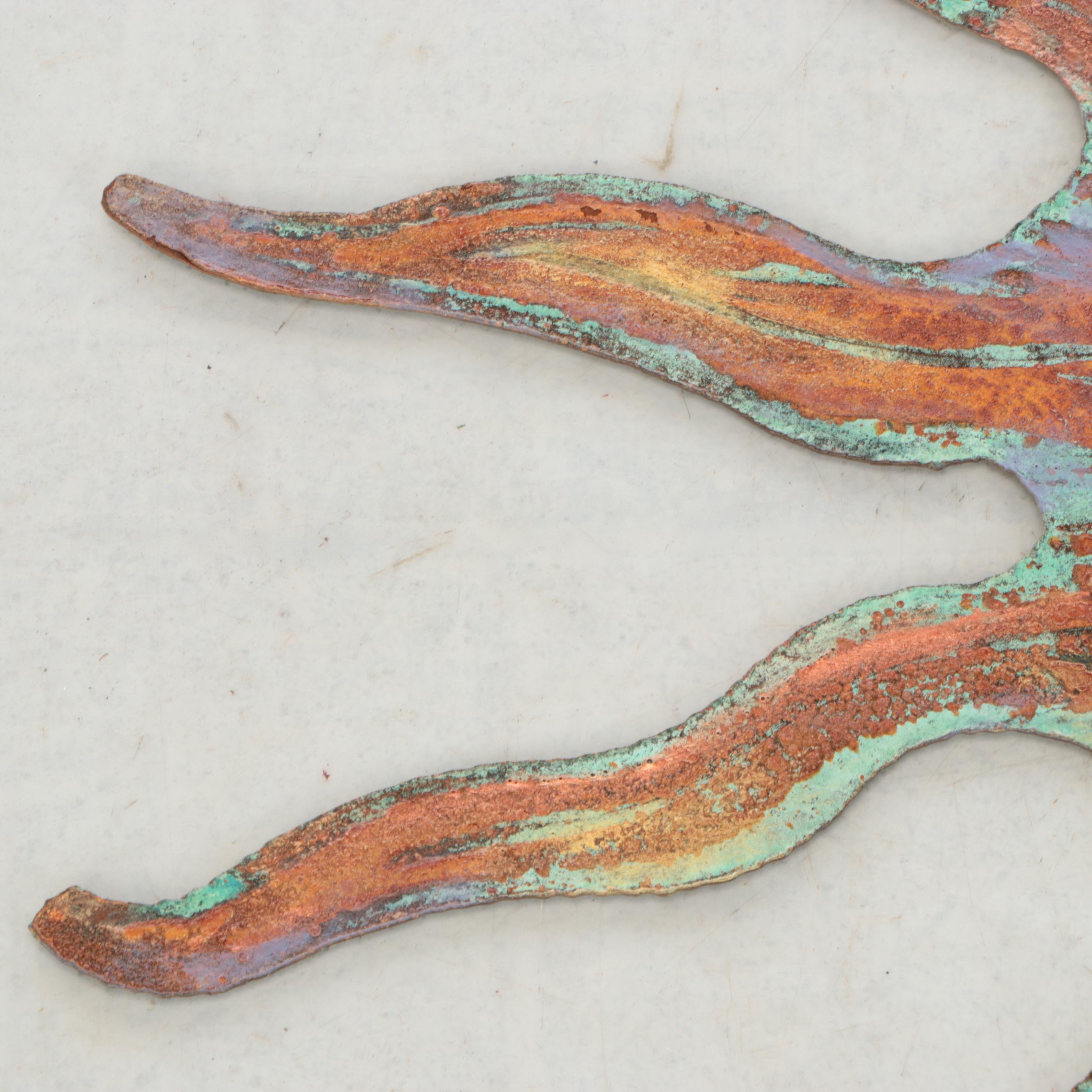 Patinated Metal Sunburst Wall Hanging