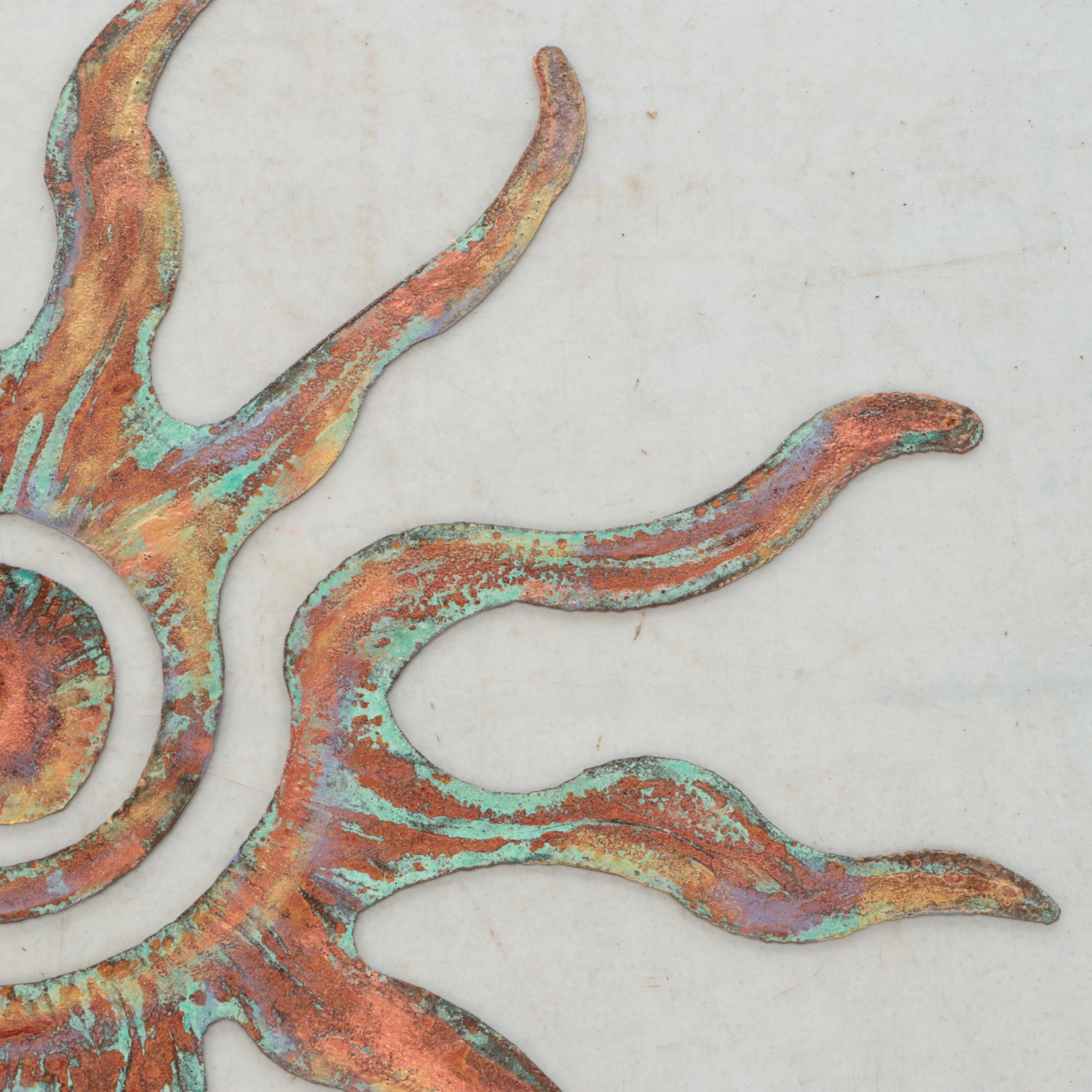 Patinated Metal Sunburst Wall Hanging