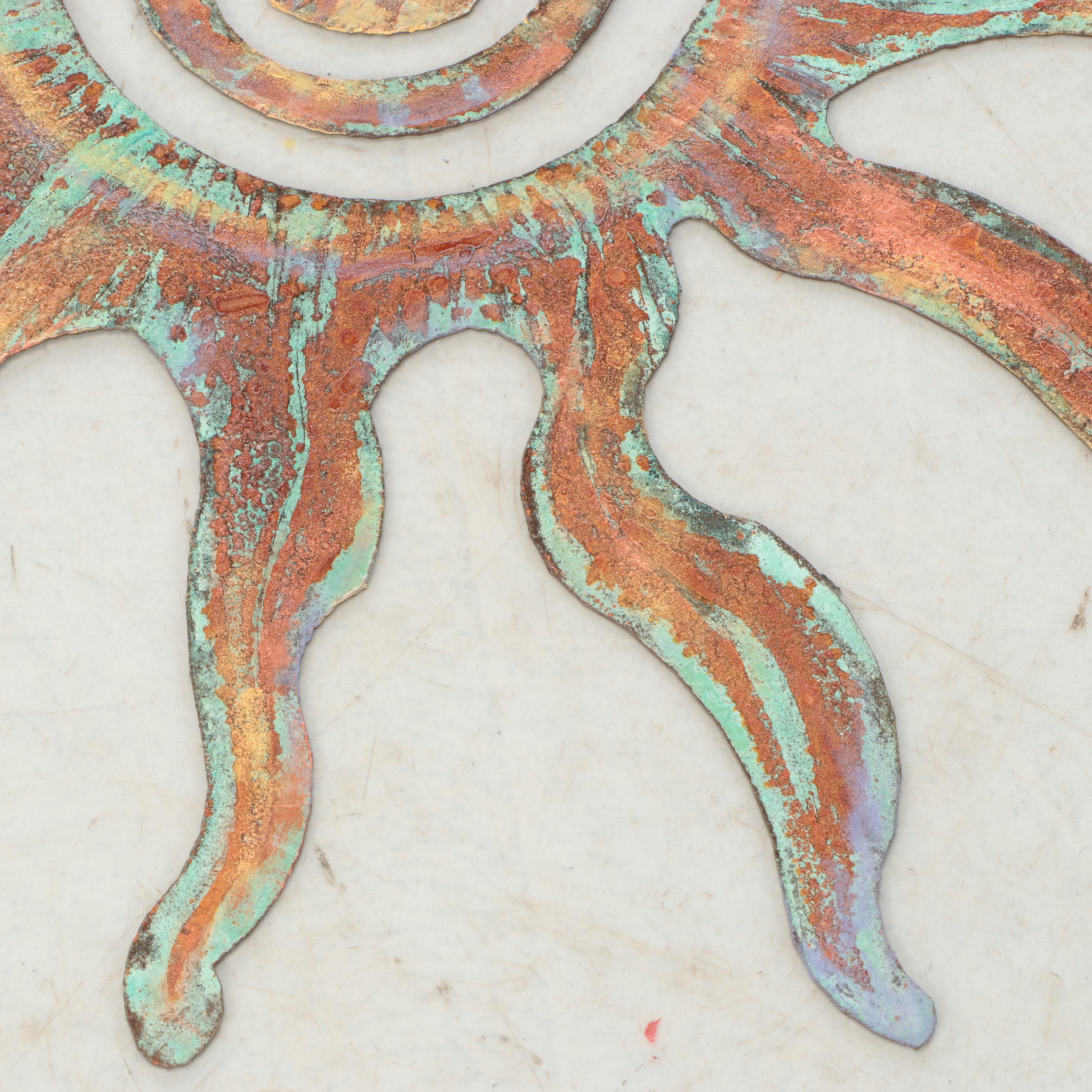 Patinated Metal Sunburst Wall Hanging
