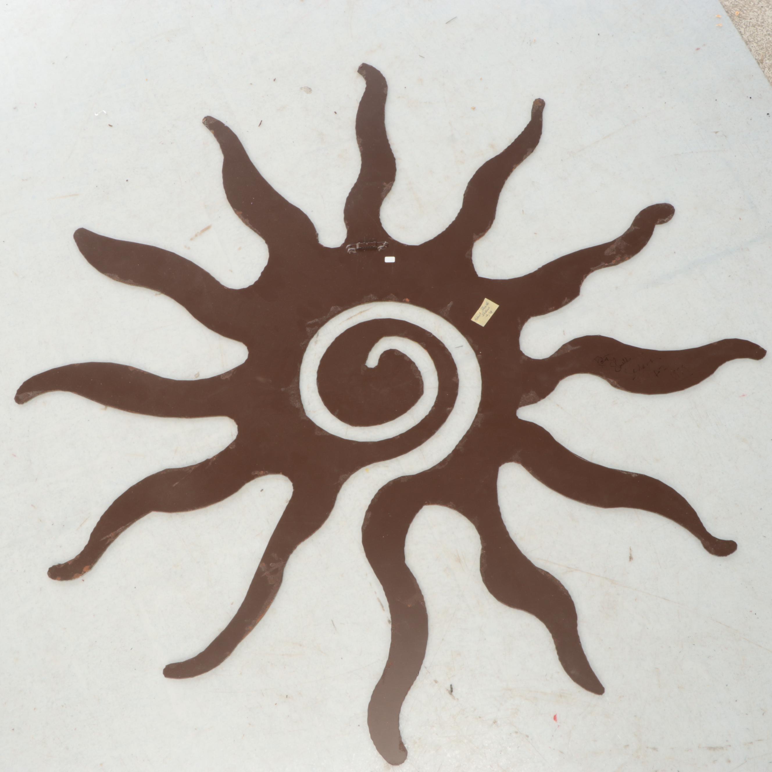 Patinated Metal Sunburst Wall Hanging