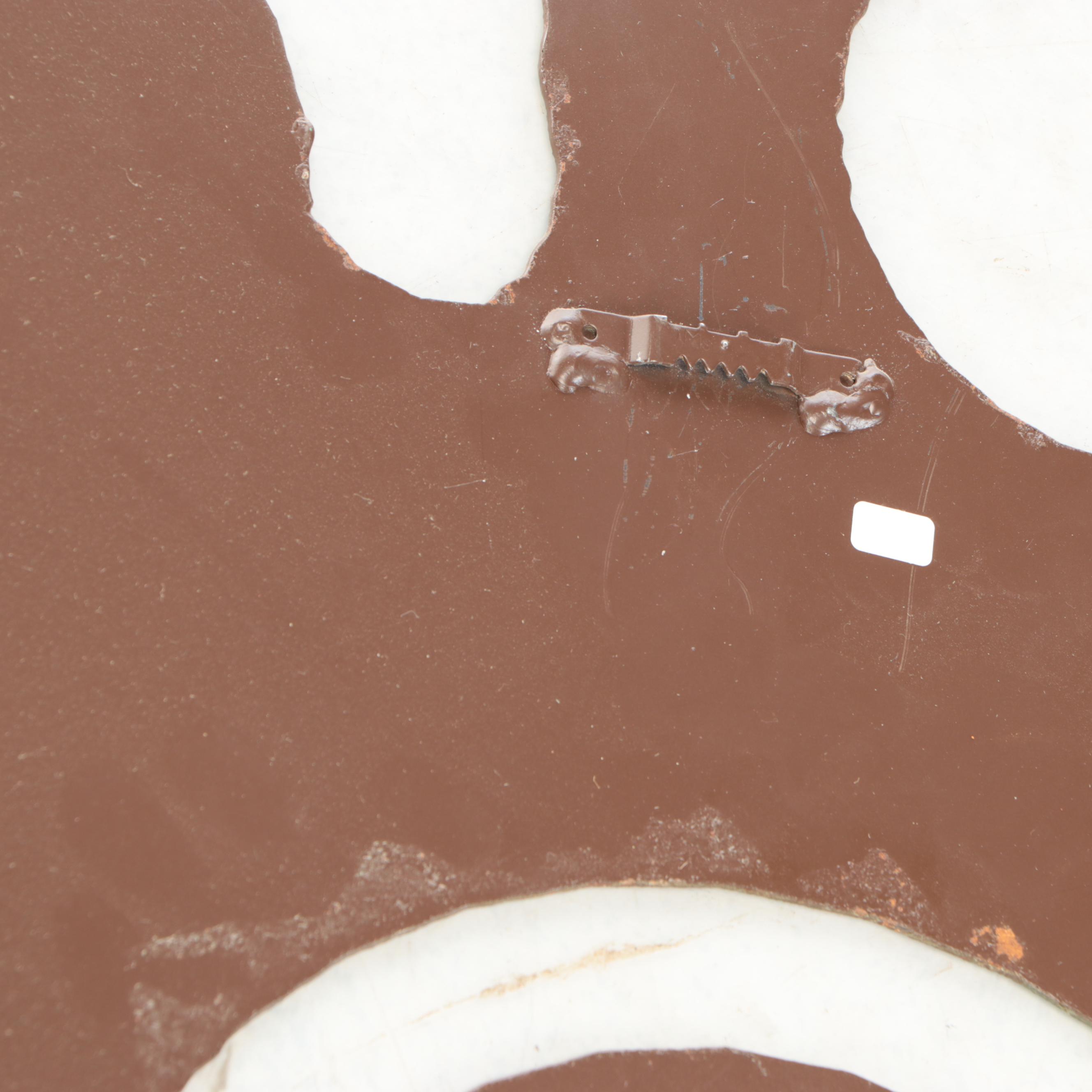 Patinated Metal Sunburst Wall Hanging