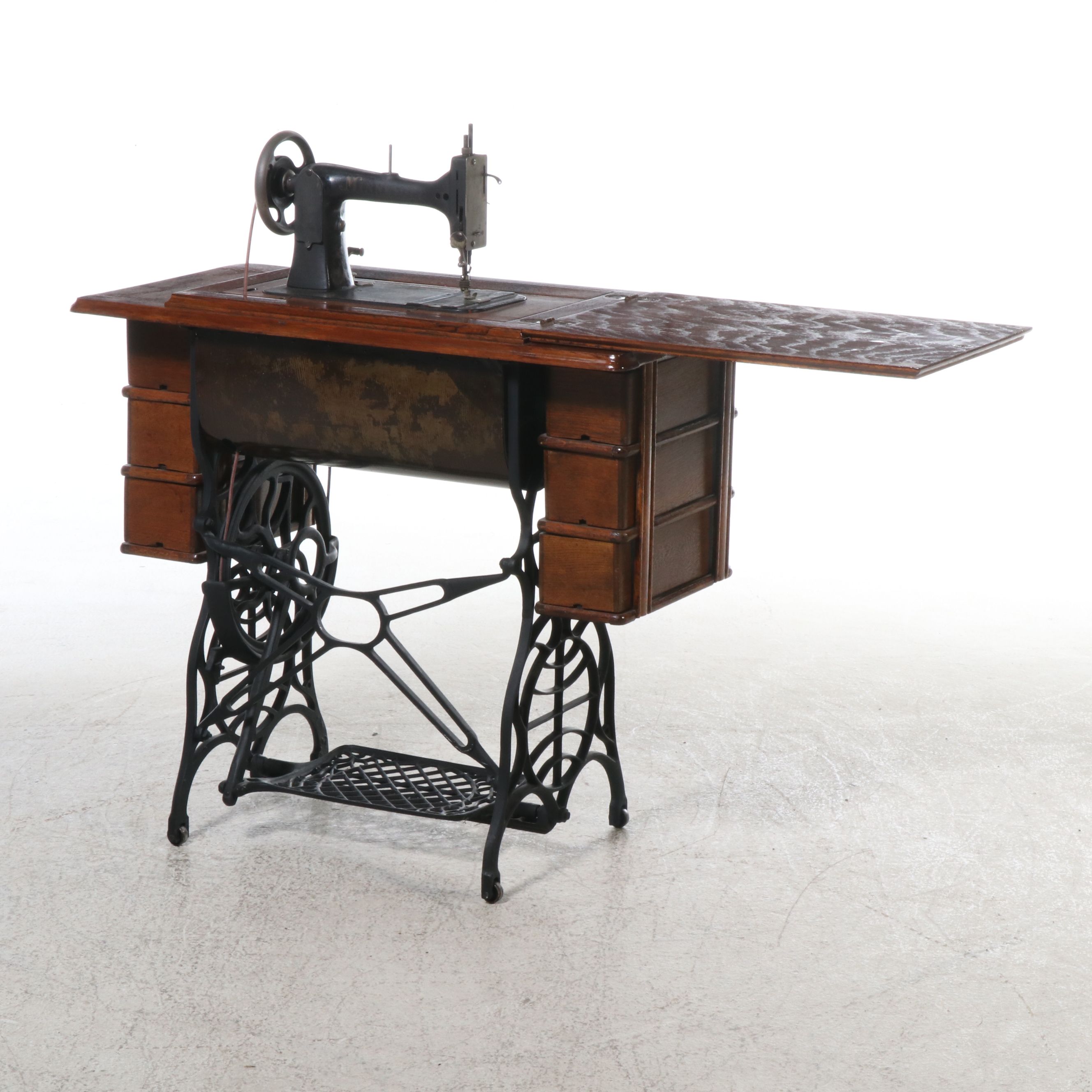 DRT Minnesota Model B Oak Cabinet Treadle Sewing Machine