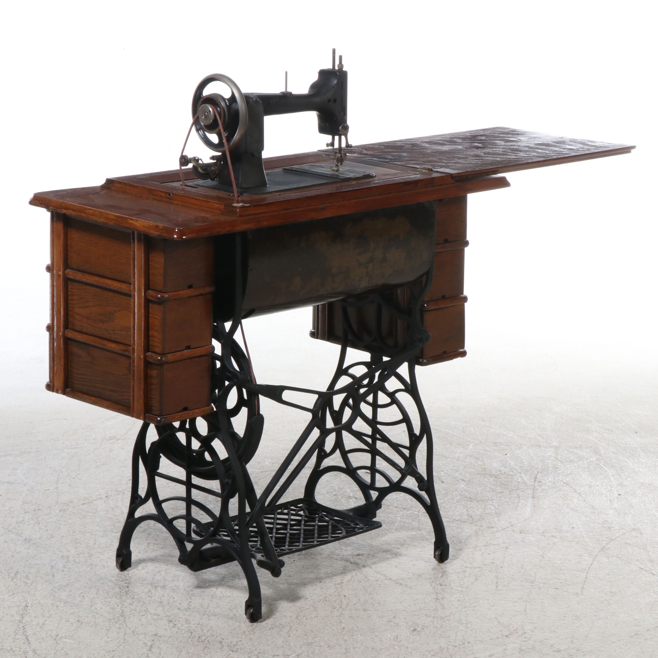 DRT Minnesota Model B Oak Cabinet Treadle Sewing Machine