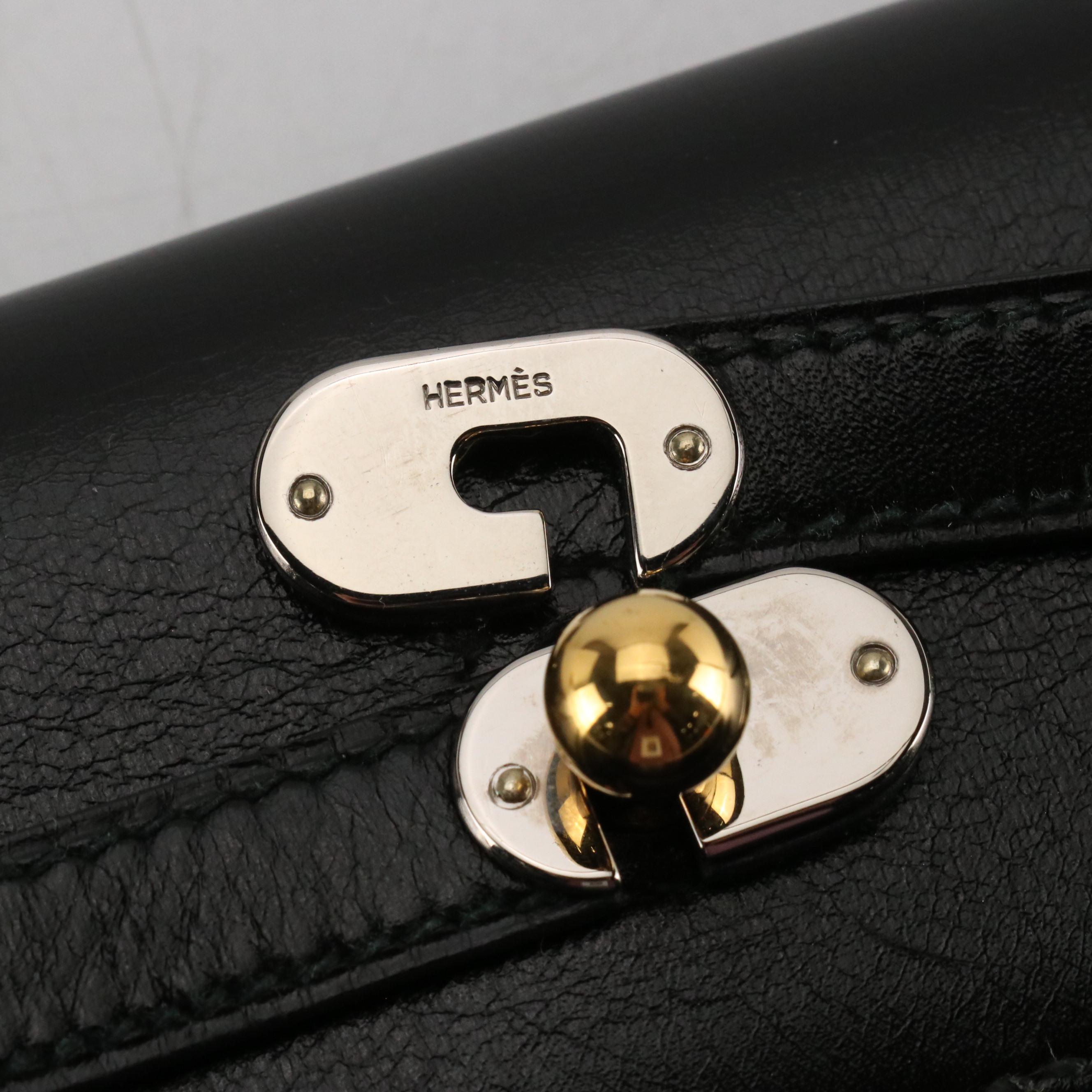Hermès Kelly Crutch Clutch in Box Calf Leather with Electrum Hardware