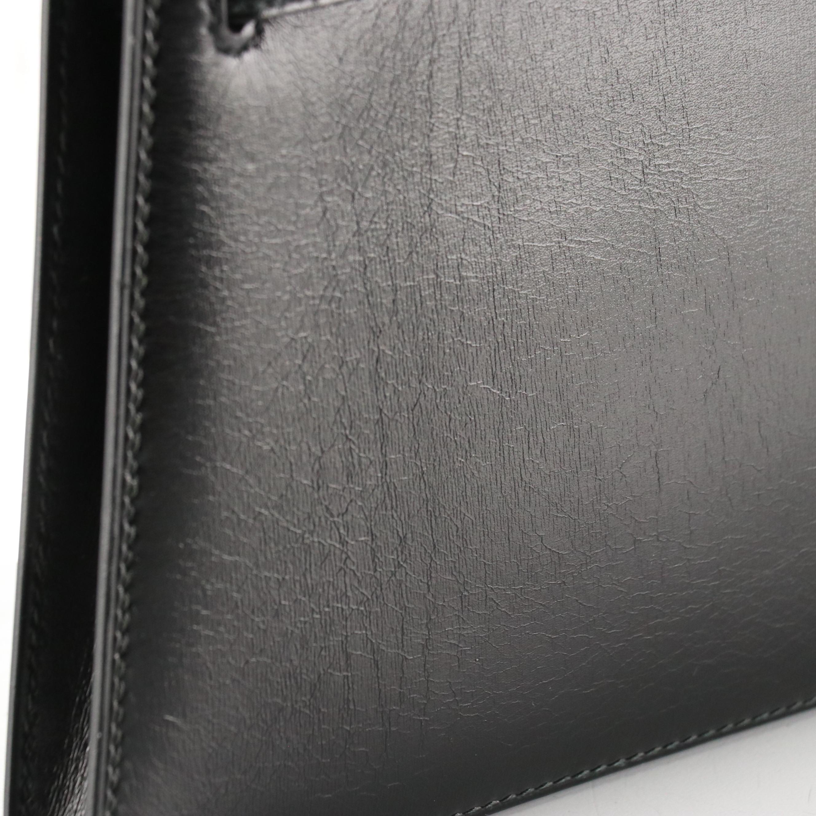 Hermès Kelly Crutch Clutch in Box Calf Leather with Electrum Hardware