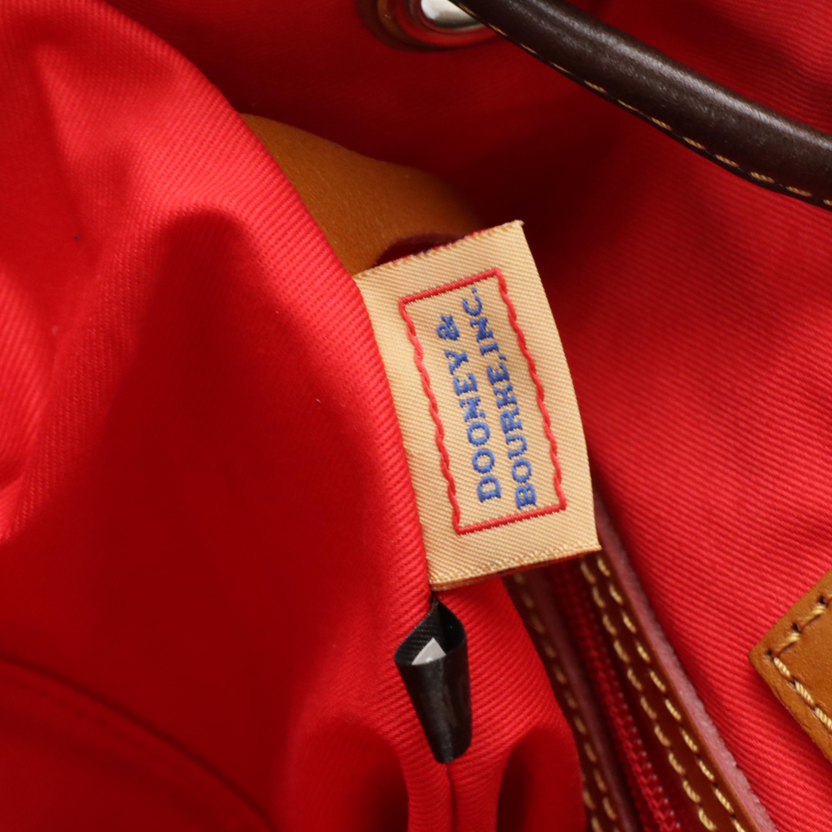 Dooney & Bourke Shiny Monogram Vachetta Florentine Leather Bags