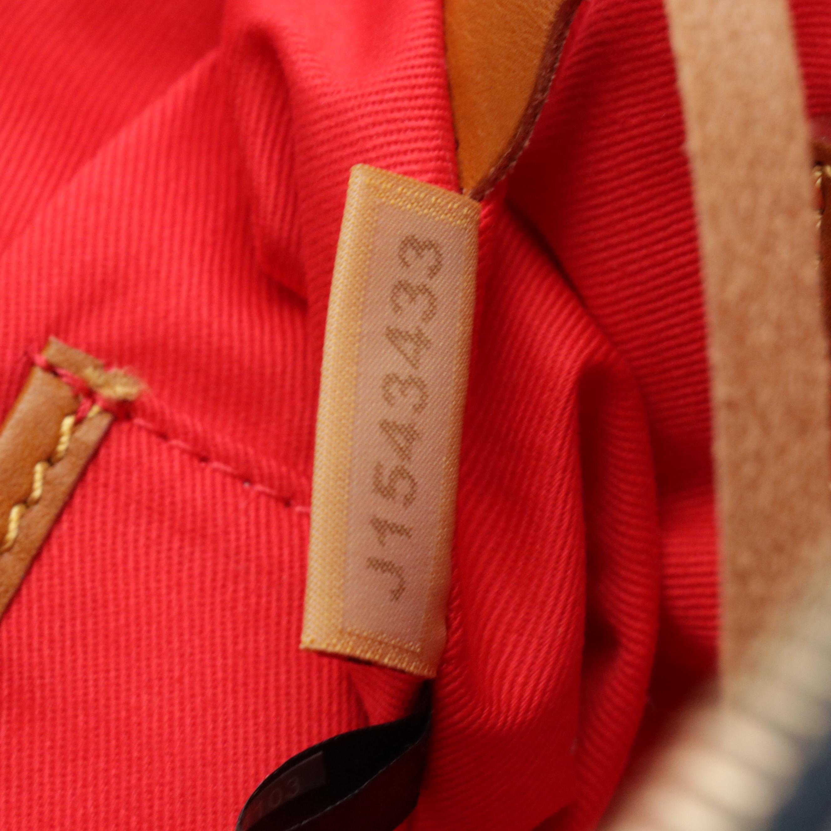 Dooney & Bourke Shiny Monogram Vachetta Florentine Leather Bags