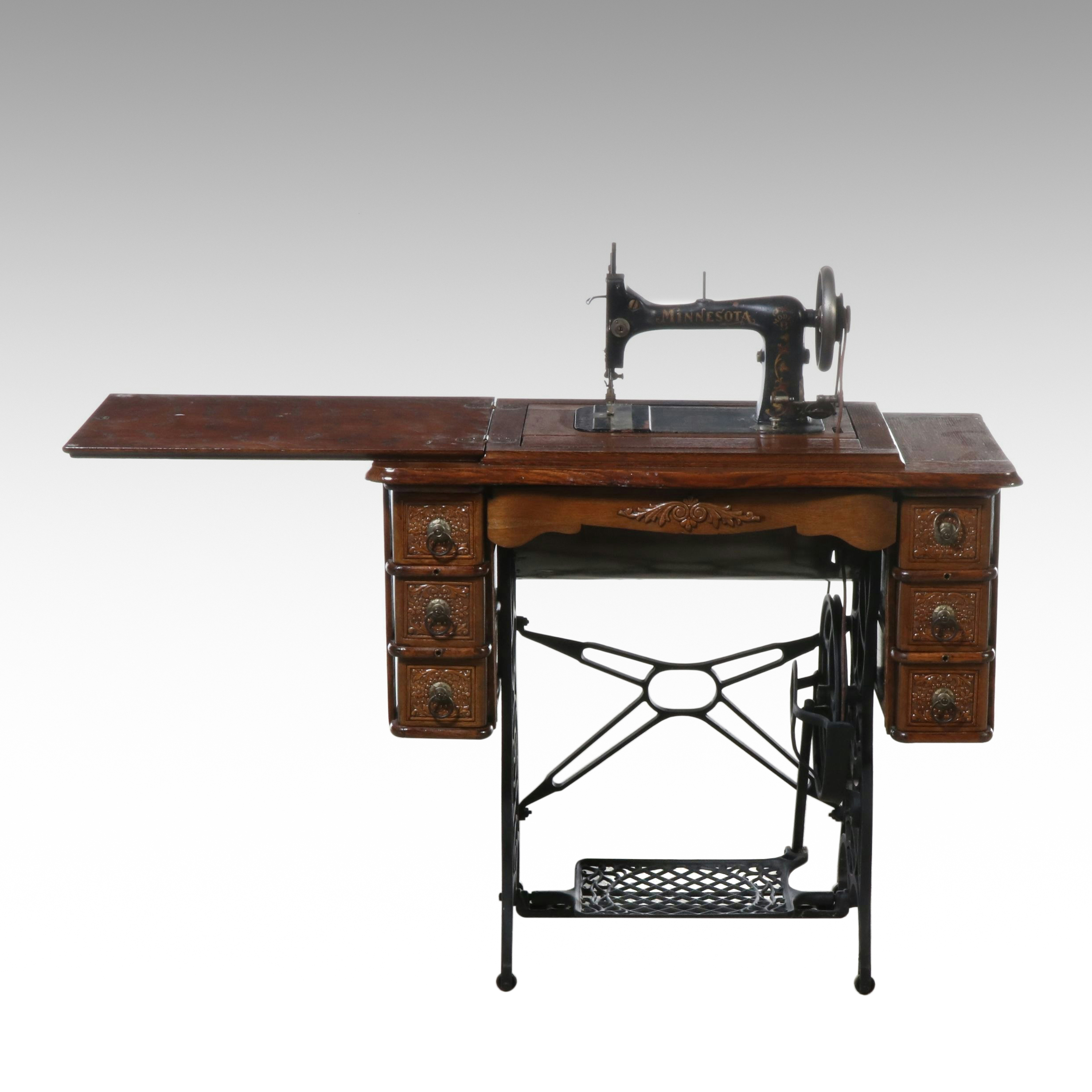 DRT Minnesota Model B Oak Cabinet Treadle Sewing Machine