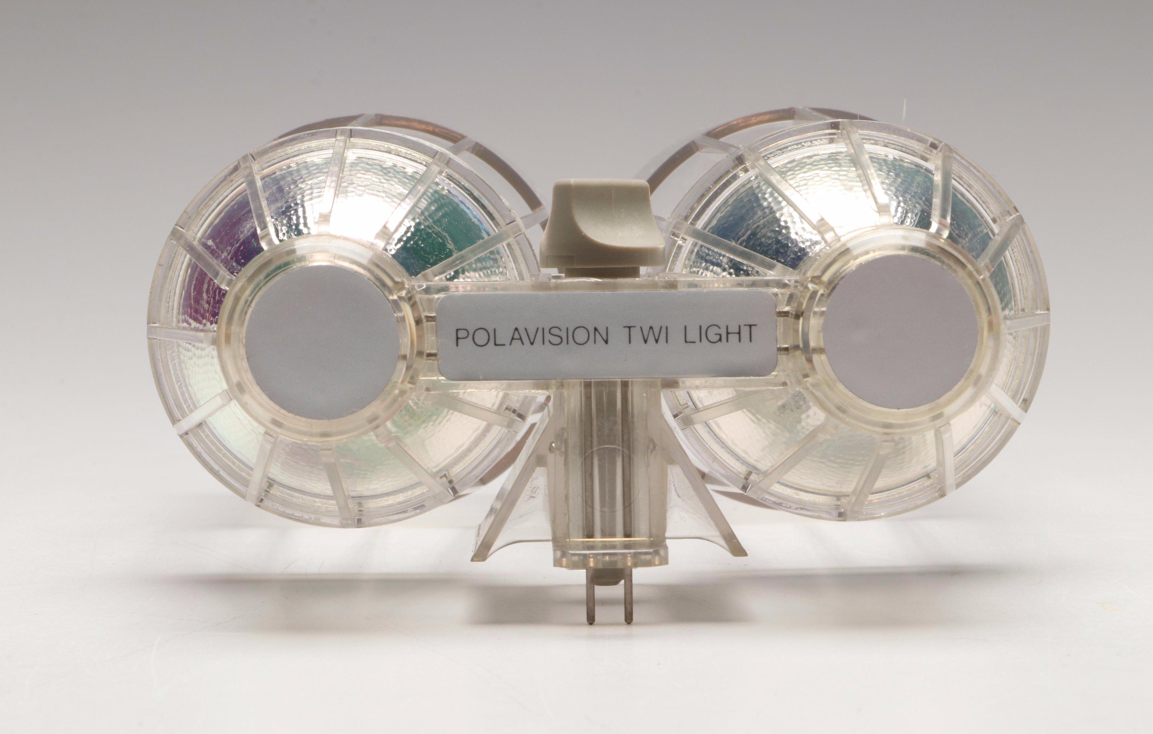 Polaroid "Polavision" Land Camera and Bell & Howell Electric Eye 127