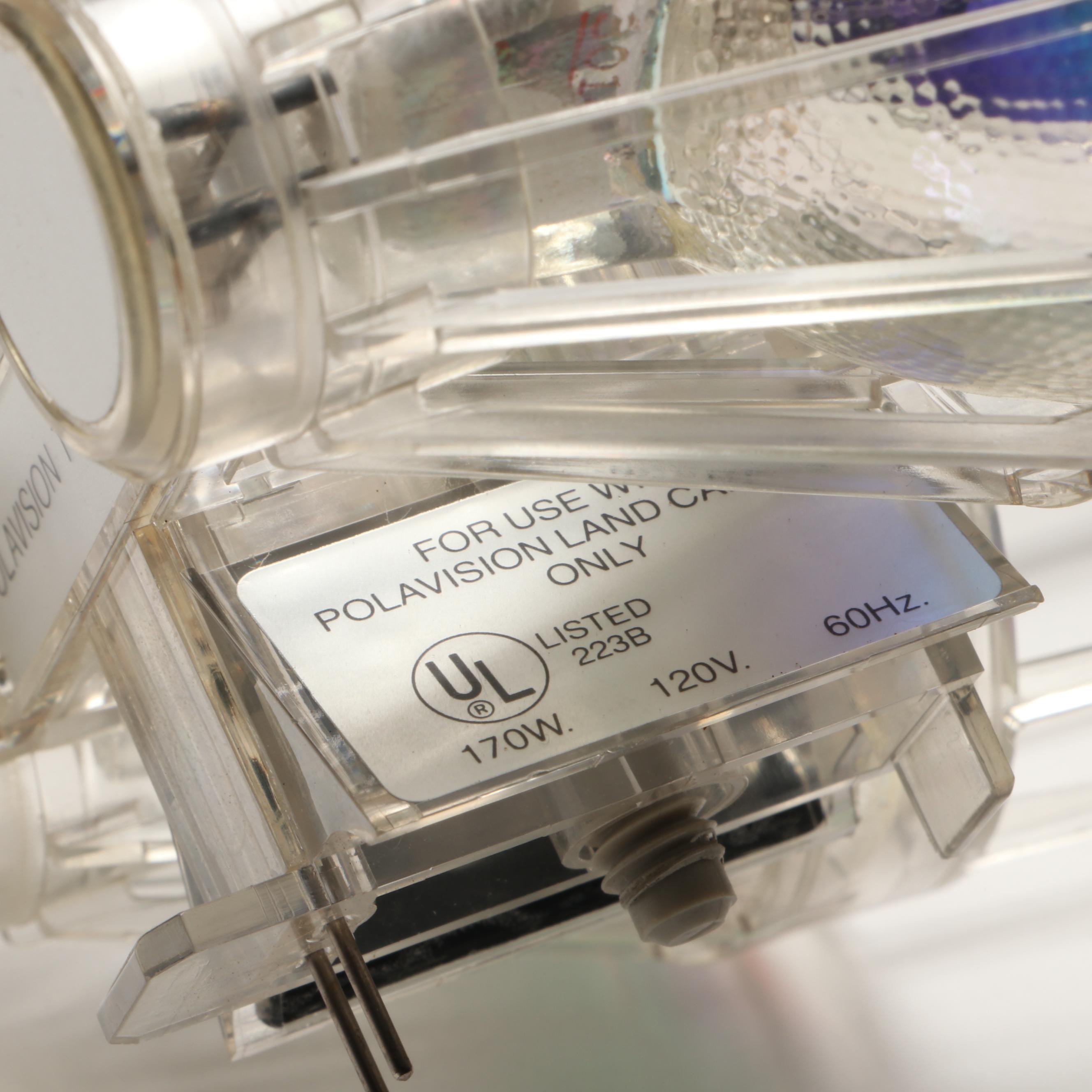 Polaroid "Polavision" Land Camera and Bell & Howell Electric Eye 127