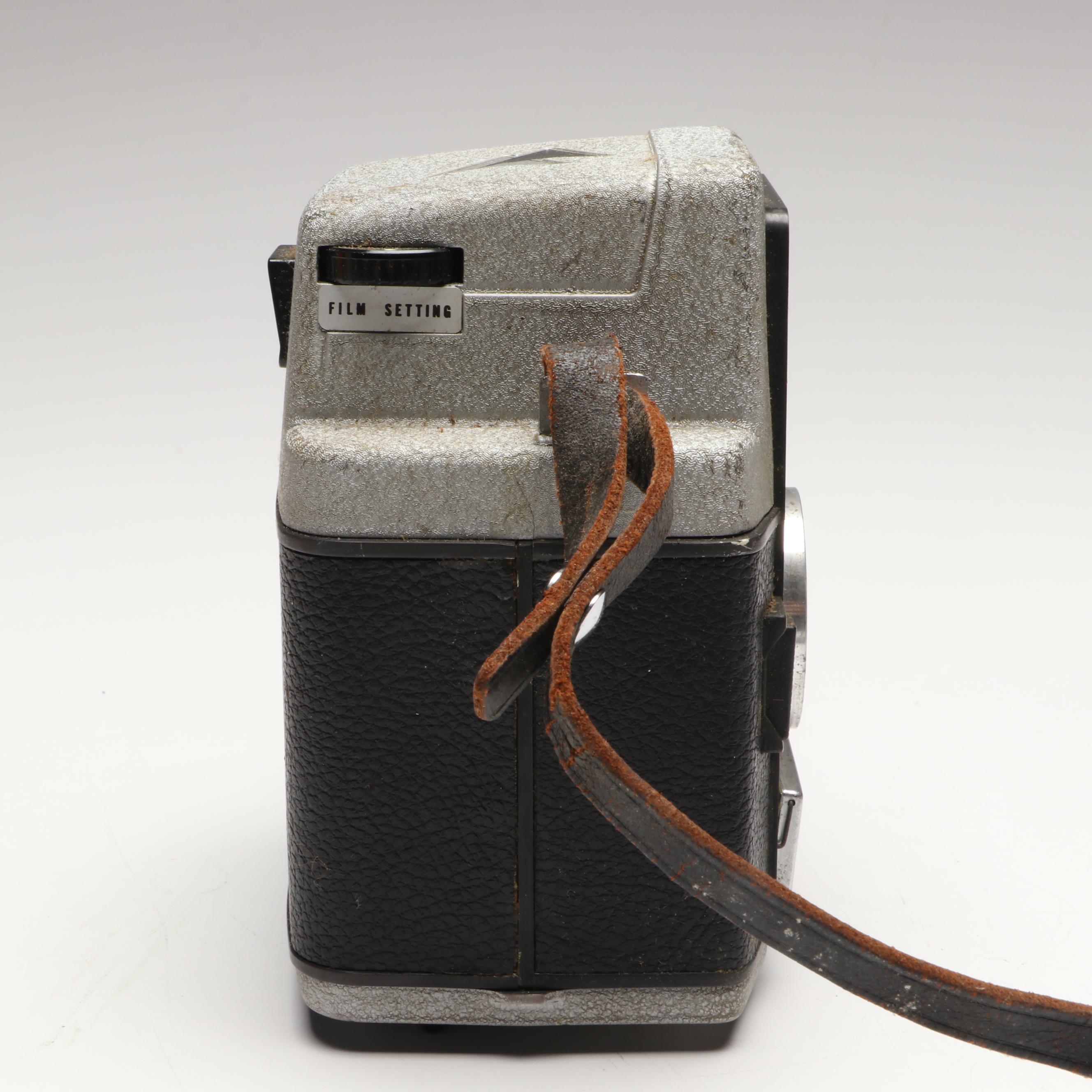 Polaroid "Polavision" Land Camera and Bell & Howell Electric Eye 127