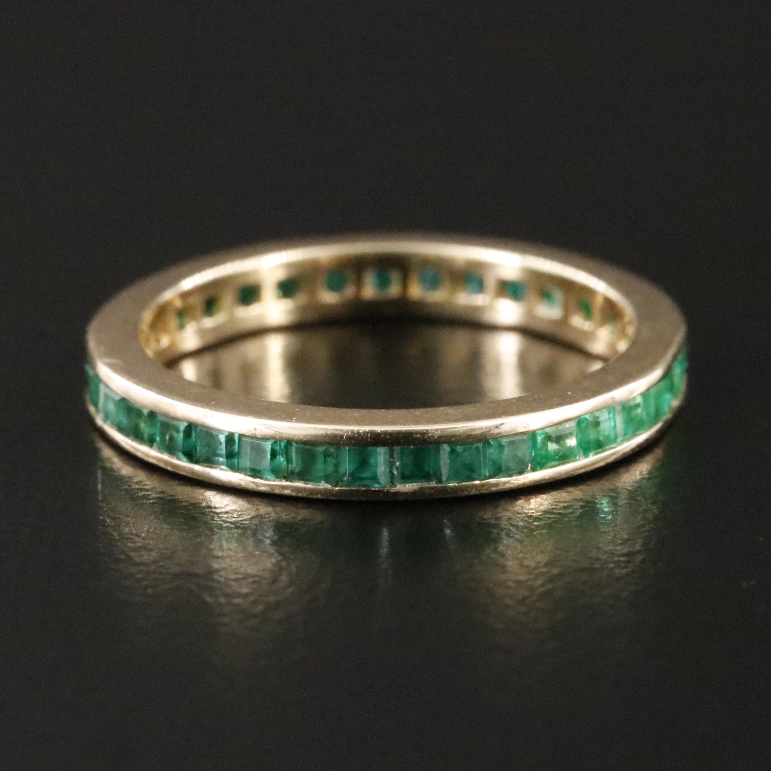 14K Spinel Triplet and Emerald Eternity Band
