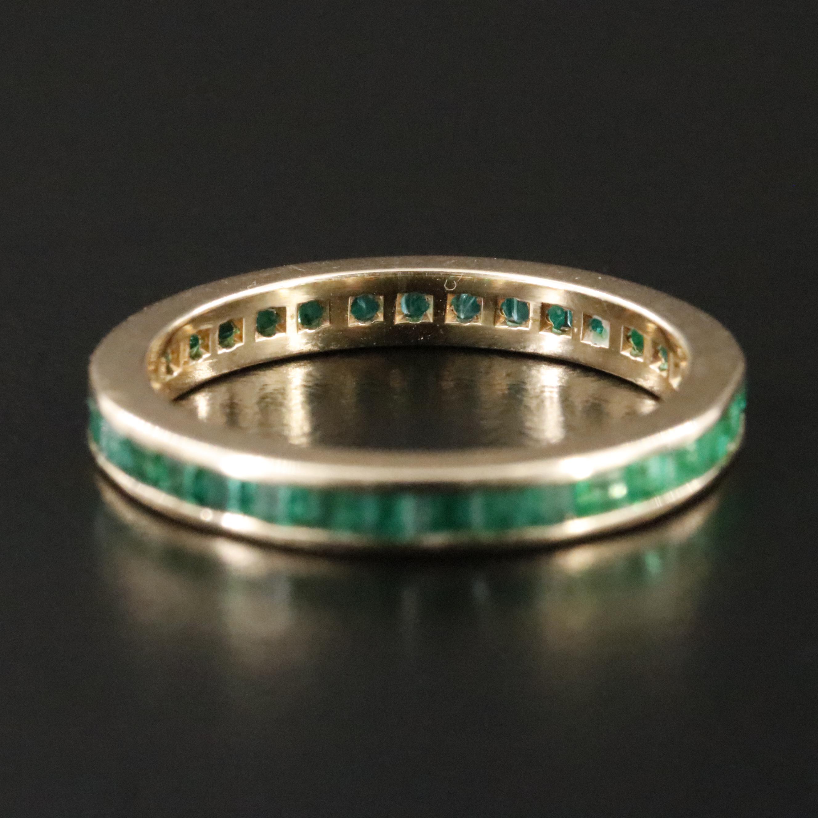 14K Spinel Triplet and Emerald Eternity Band