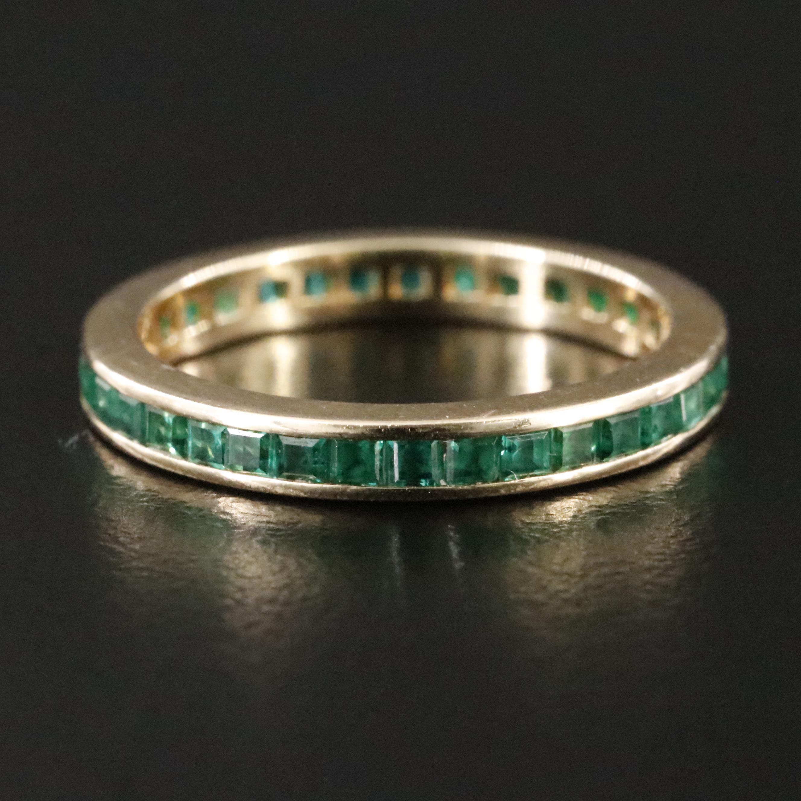 14K Spinel Triplet and Emerald Eternity Band