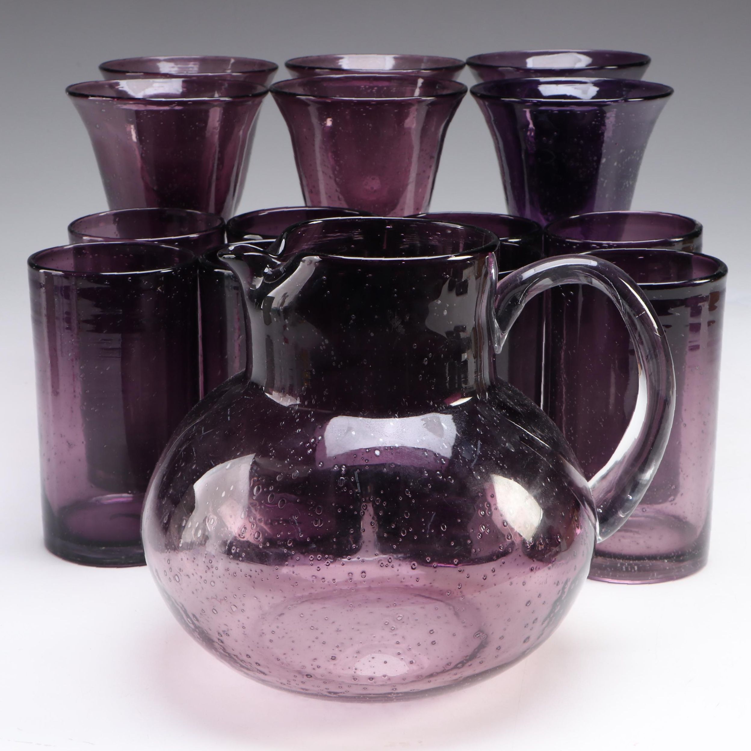 Artland "Salute" Water Goblets with "Iris Plum" Pitcher and Highball Glasses