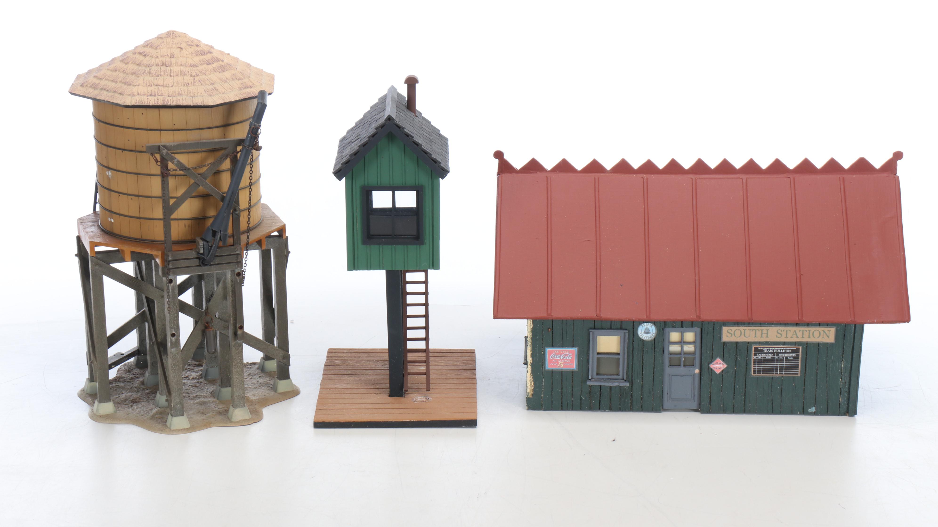 Train Station and Conductor's Building with Water Tower and Other Buildings