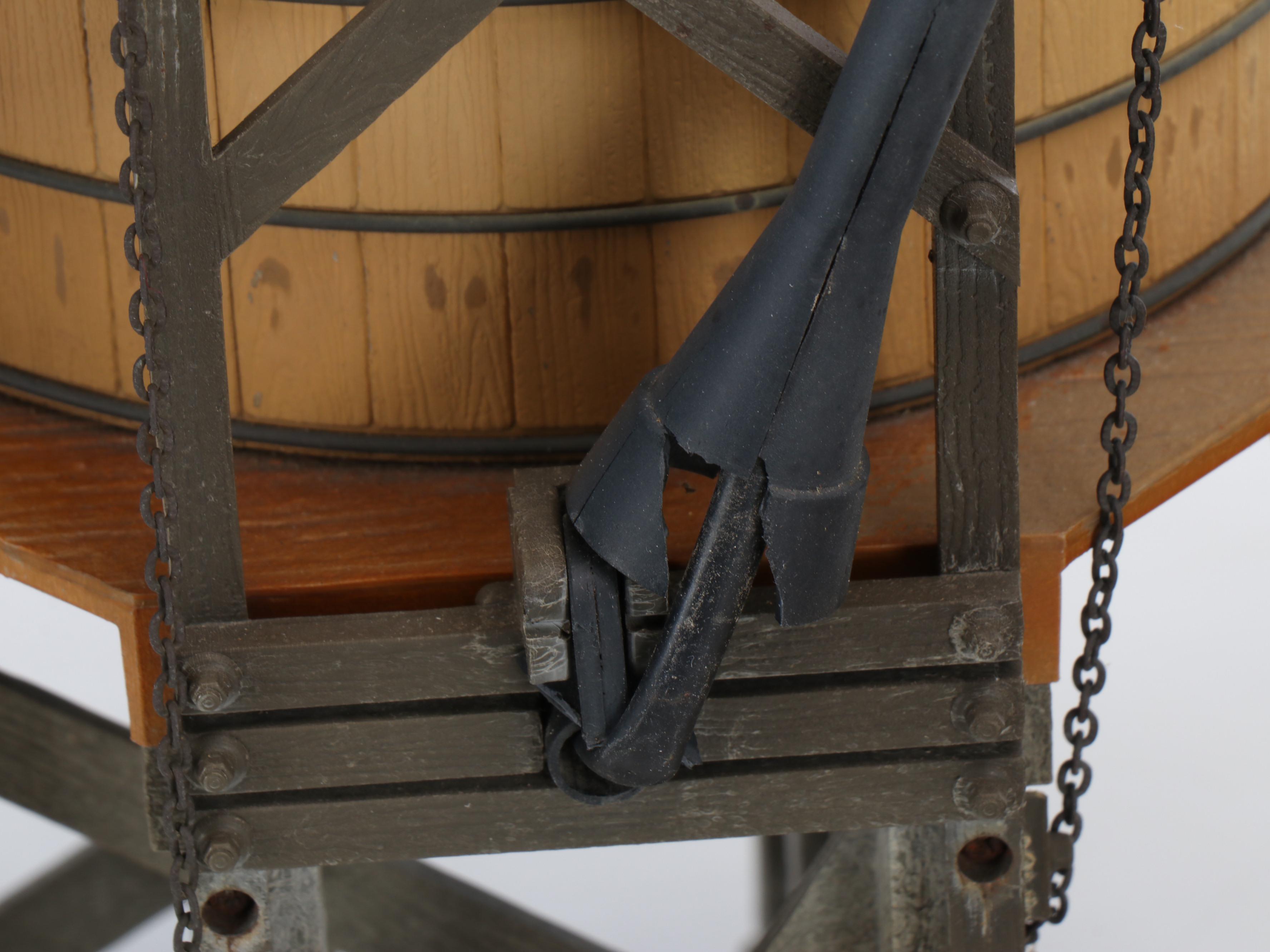 Train Station and Conductor's Building with Water Tower and Other Buildings