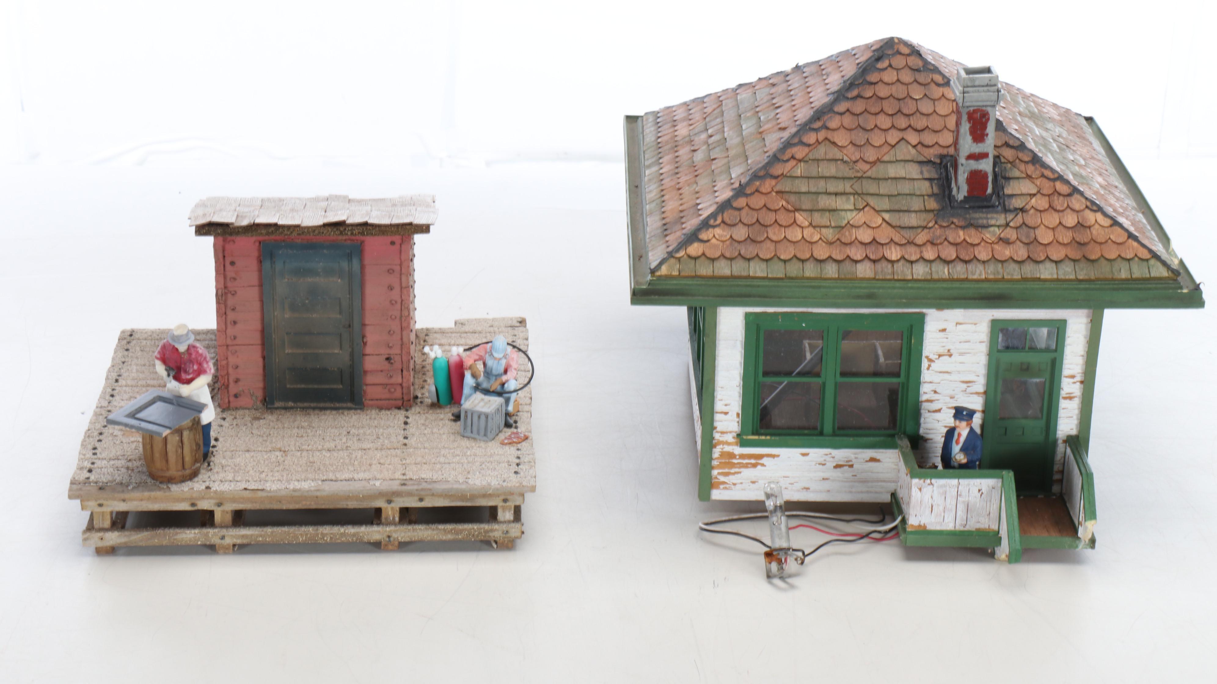 Train Station and Conductor's Building with Water Tower and Other Buildings