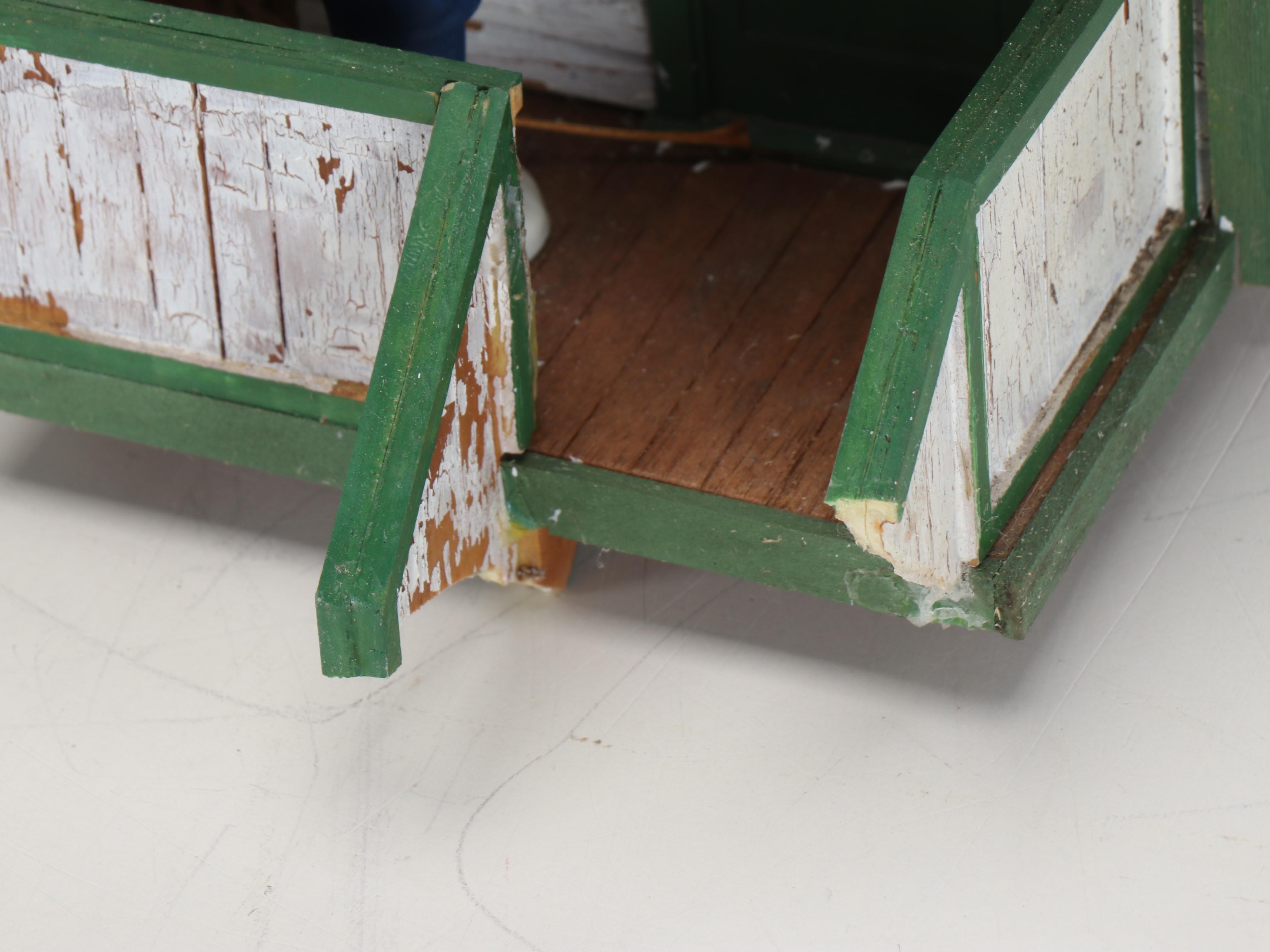 Train Station and Conductor's Building with Water Tower and Other Buildings