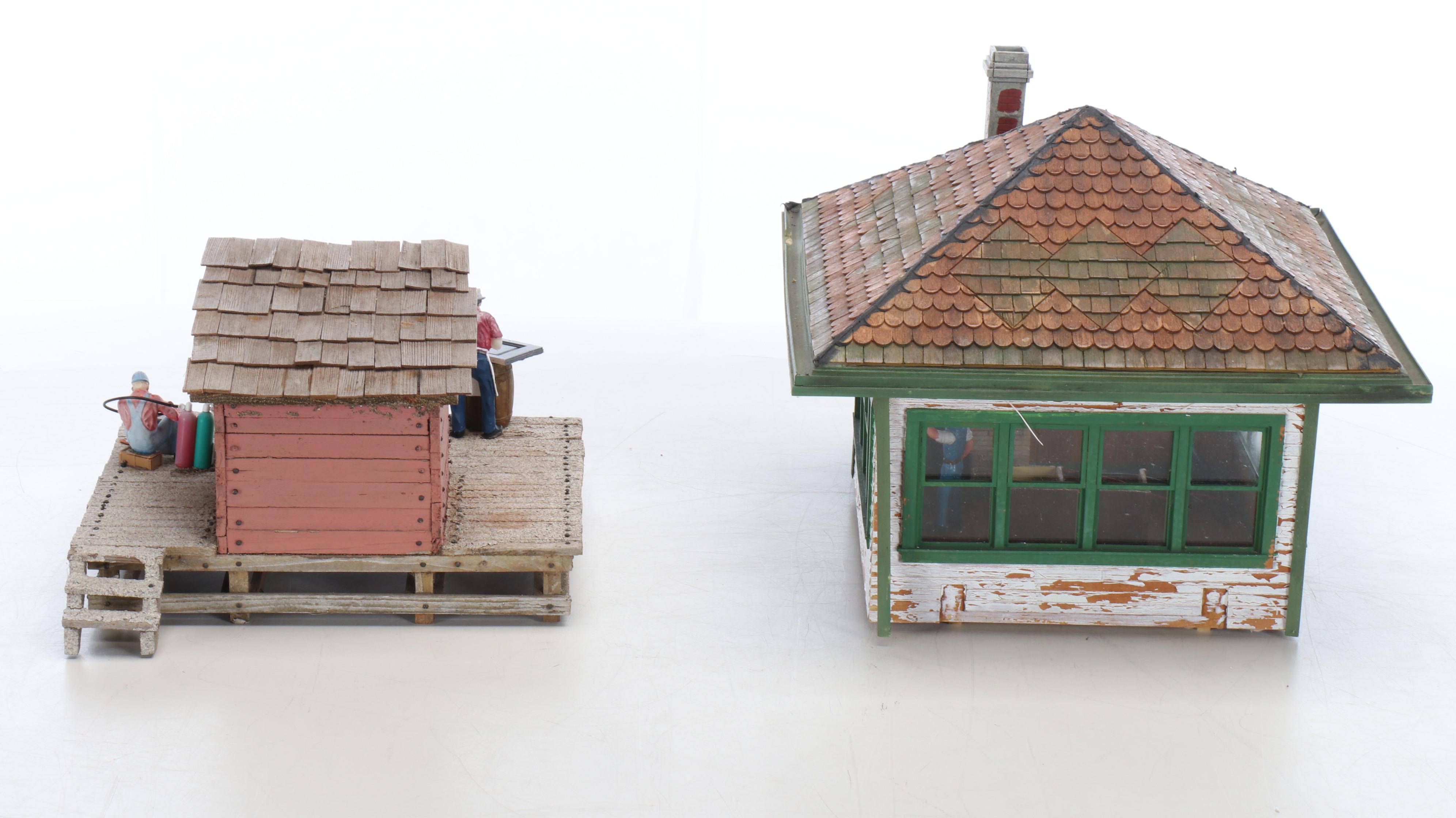 Train Station and Conductor's Building with Water Tower and Other Buildings