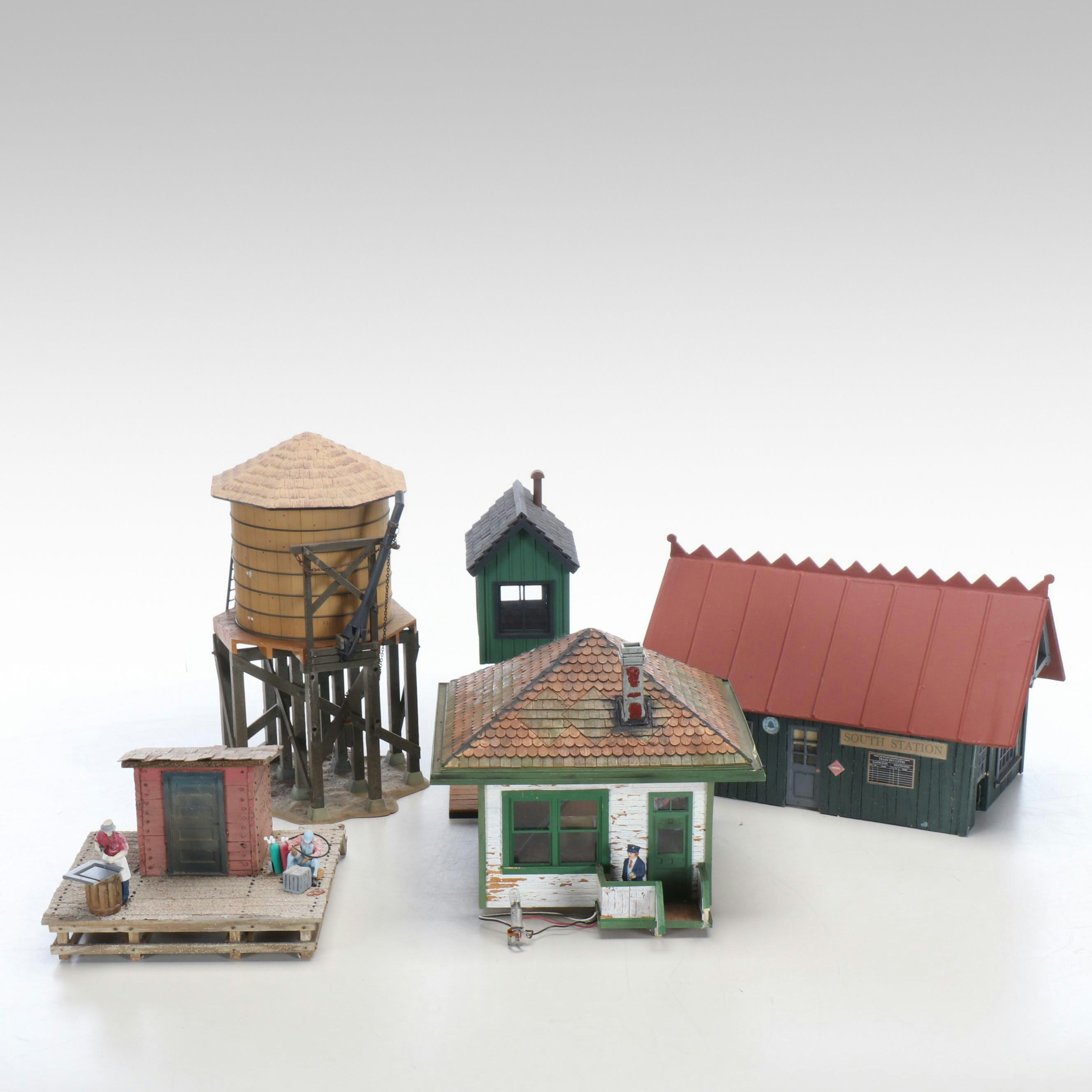 Train Station and Conductor's Building with Water Tower and Other Buildings