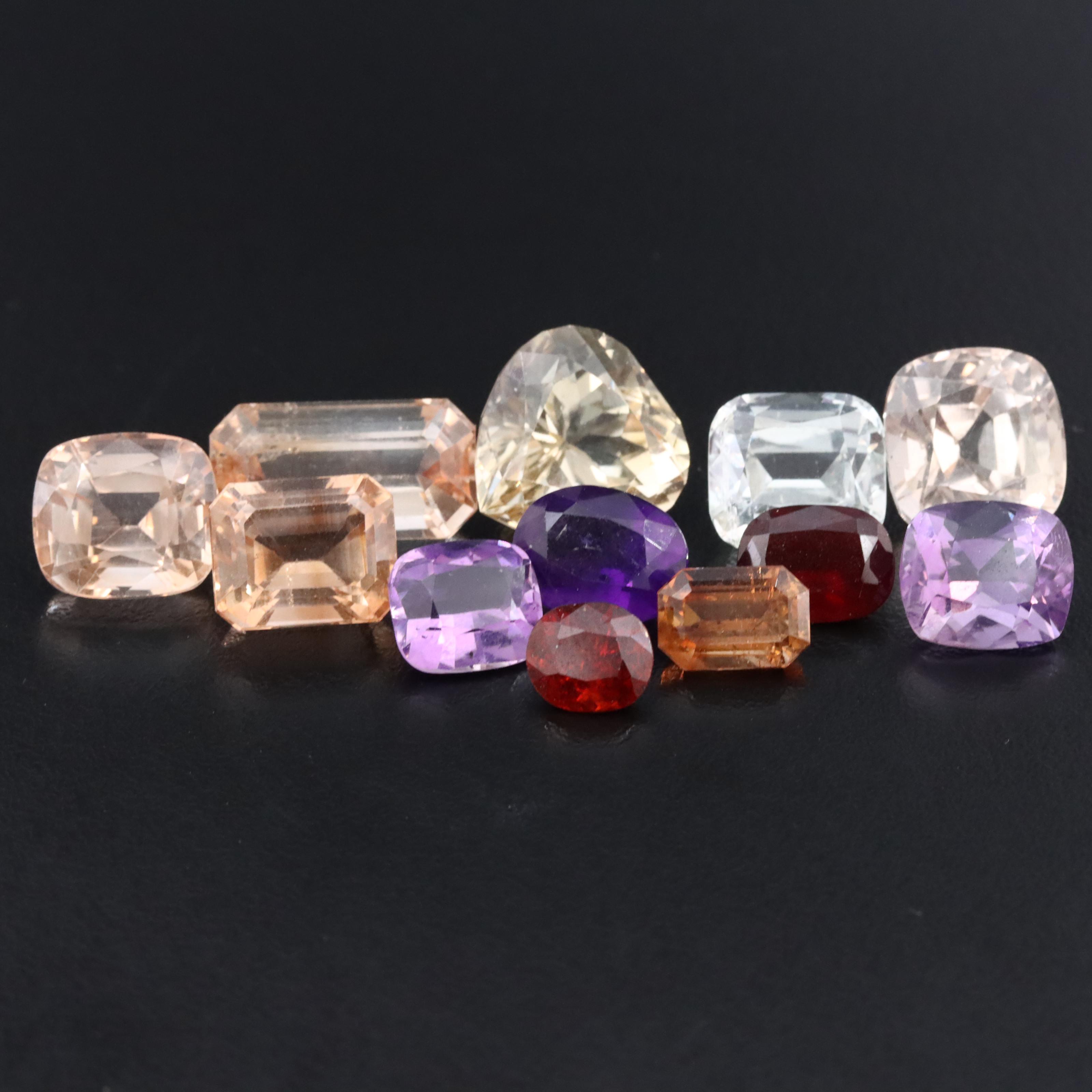 Loose 59.45 CTW Gemstone Lot Featuring Amethyst, Citrine, Garnet