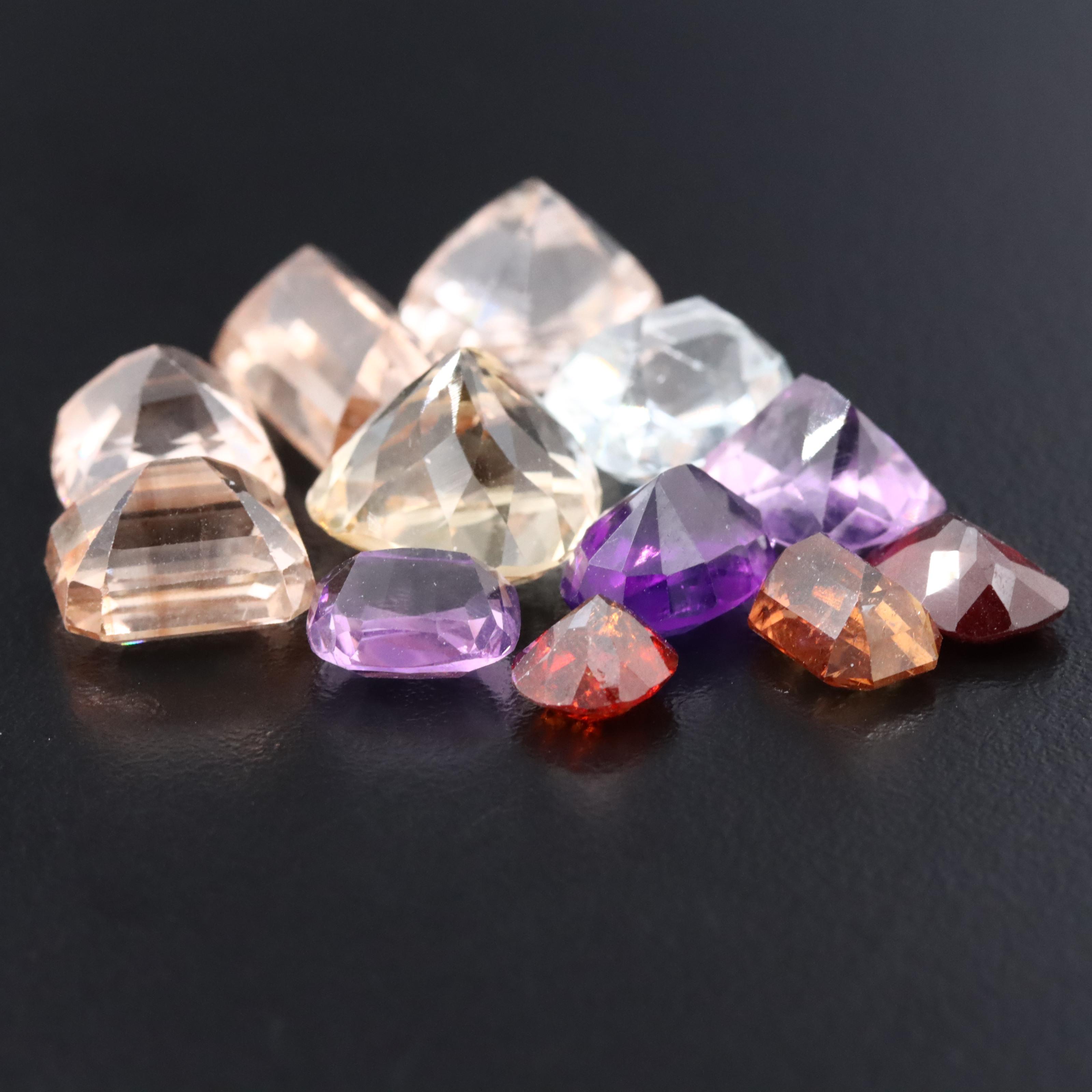 Loose 59.45 CTW Gemstone Lot Featuring Amethyst, Citrine, Garnet