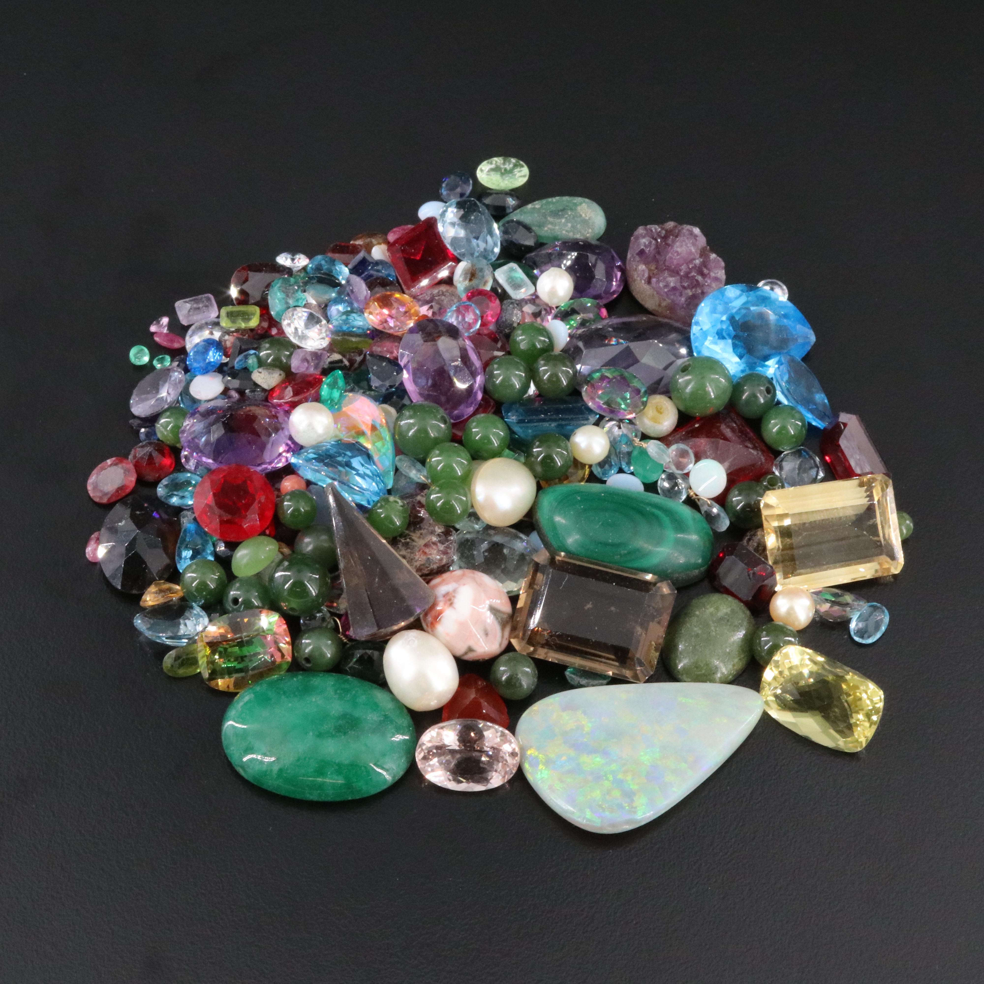 Loose Gemstone Lot Including Coral, Malachite and Amethyst